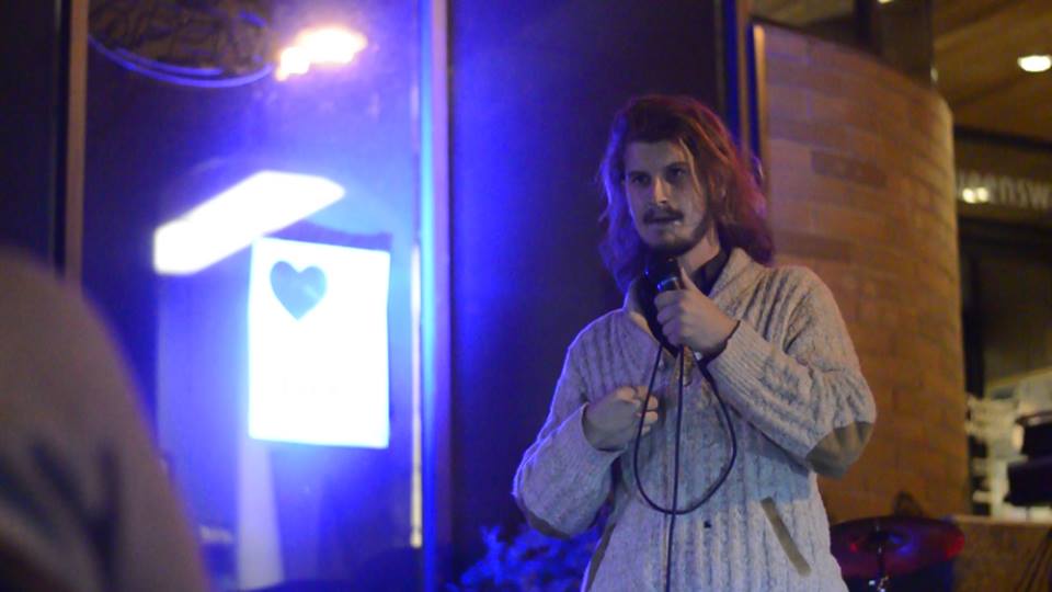 Nygel Metcalfe at the September 2015 Poetry Slam. Photo credit Adam Flockeman.