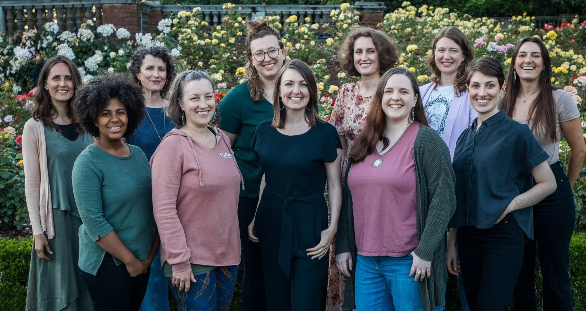Birth and Postpartum Doula Collective standing for a group photo
