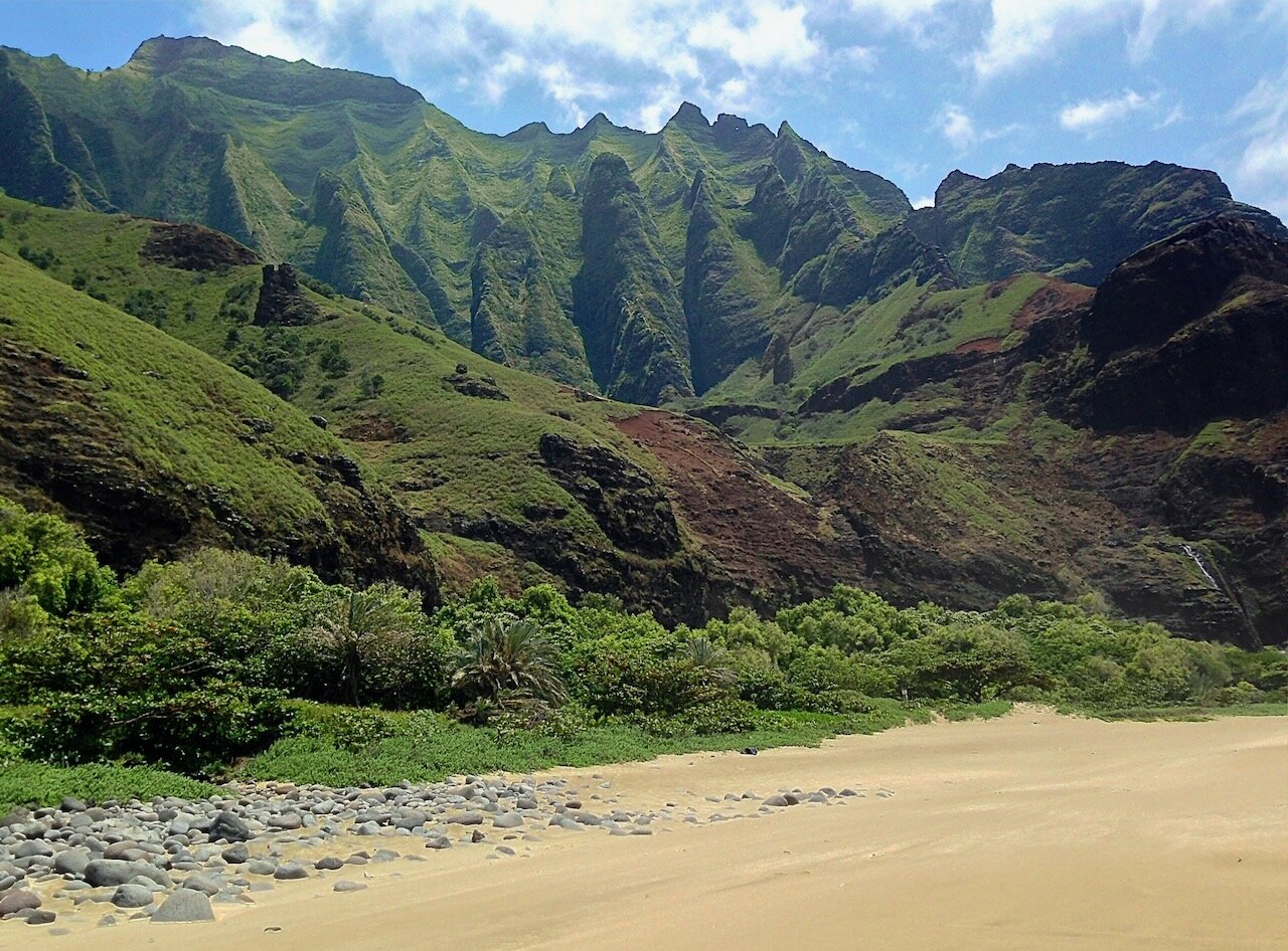   Kalalau Beach, where we camped for four nights under the cliffs and trees.  