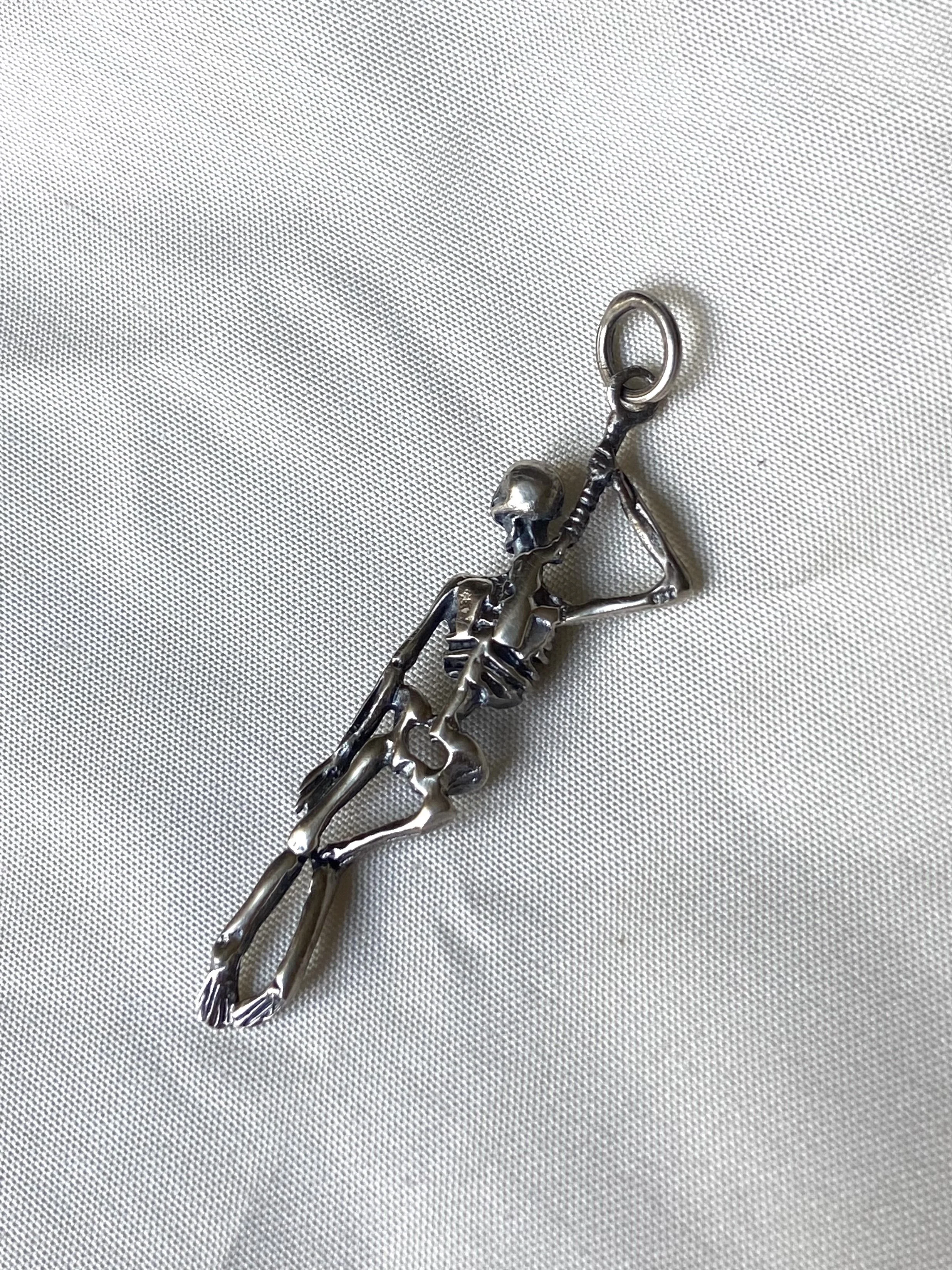 skeletonpendantback.jpeg