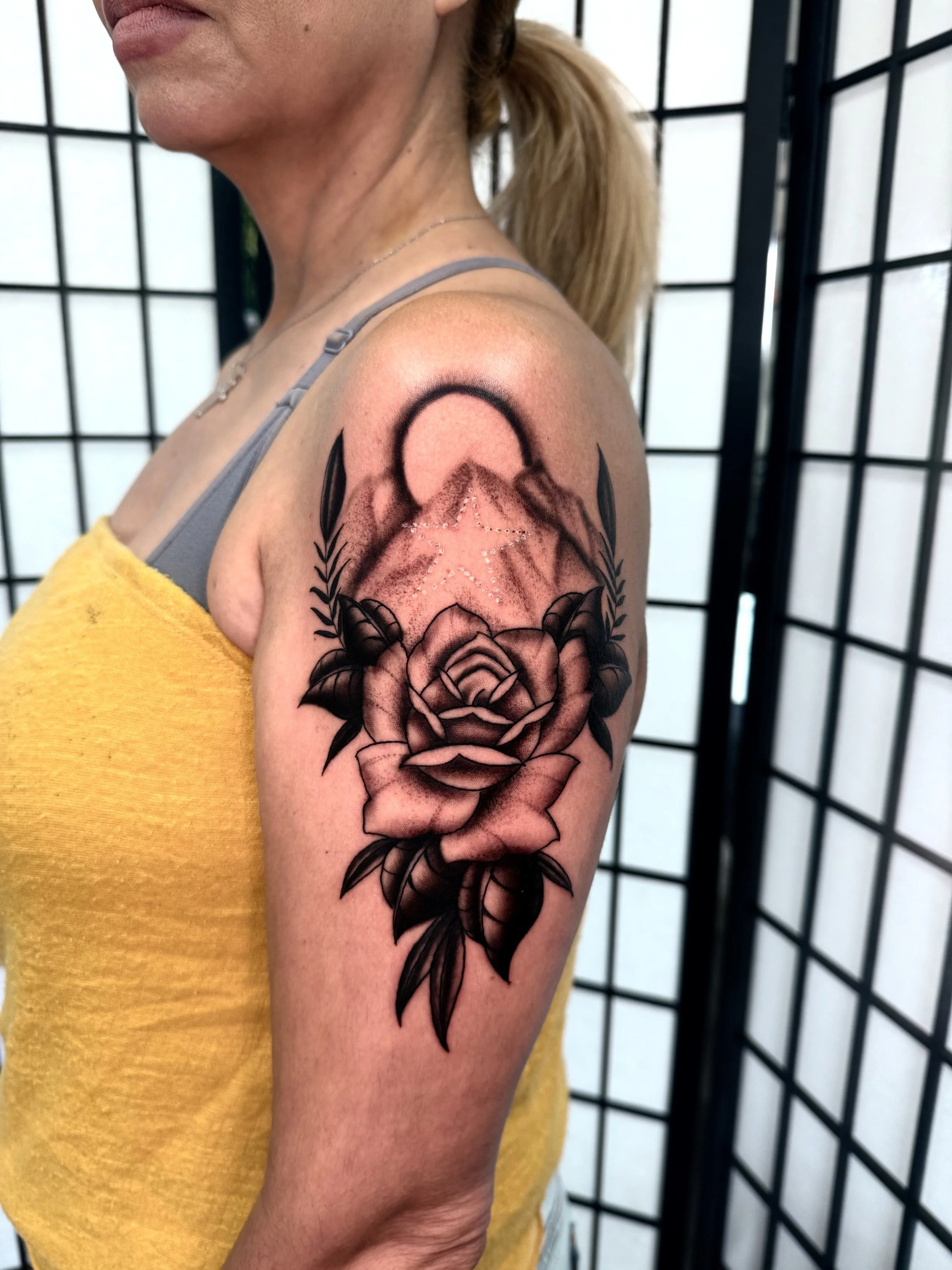Rose tattoo completed by an artist at Superfly Tattoo in downtown San Diego