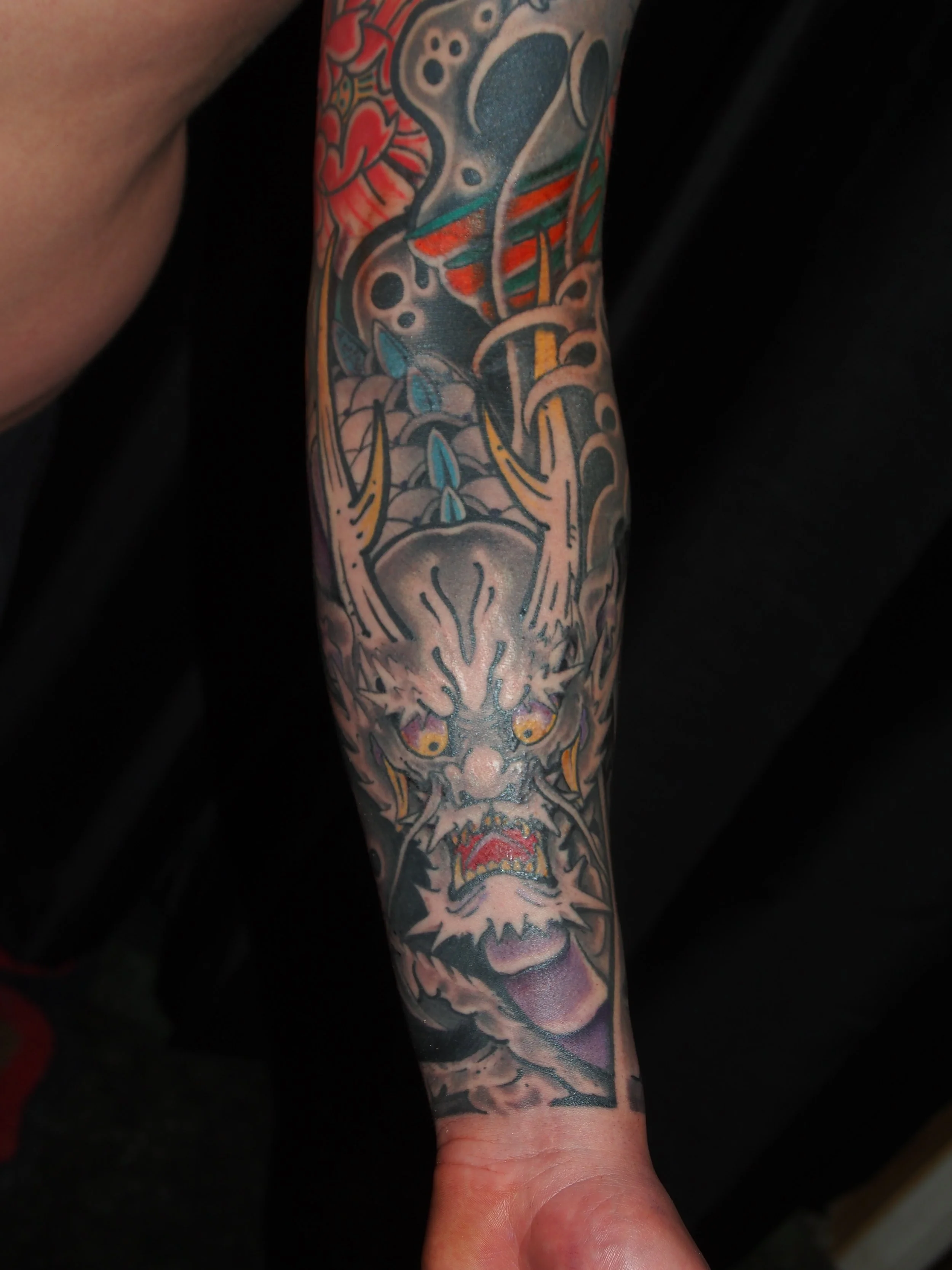 Japanese irezumi koi and dragon sleeve tattoo by Dominic Vasquez at Superfly Tattoo in San Diego, California