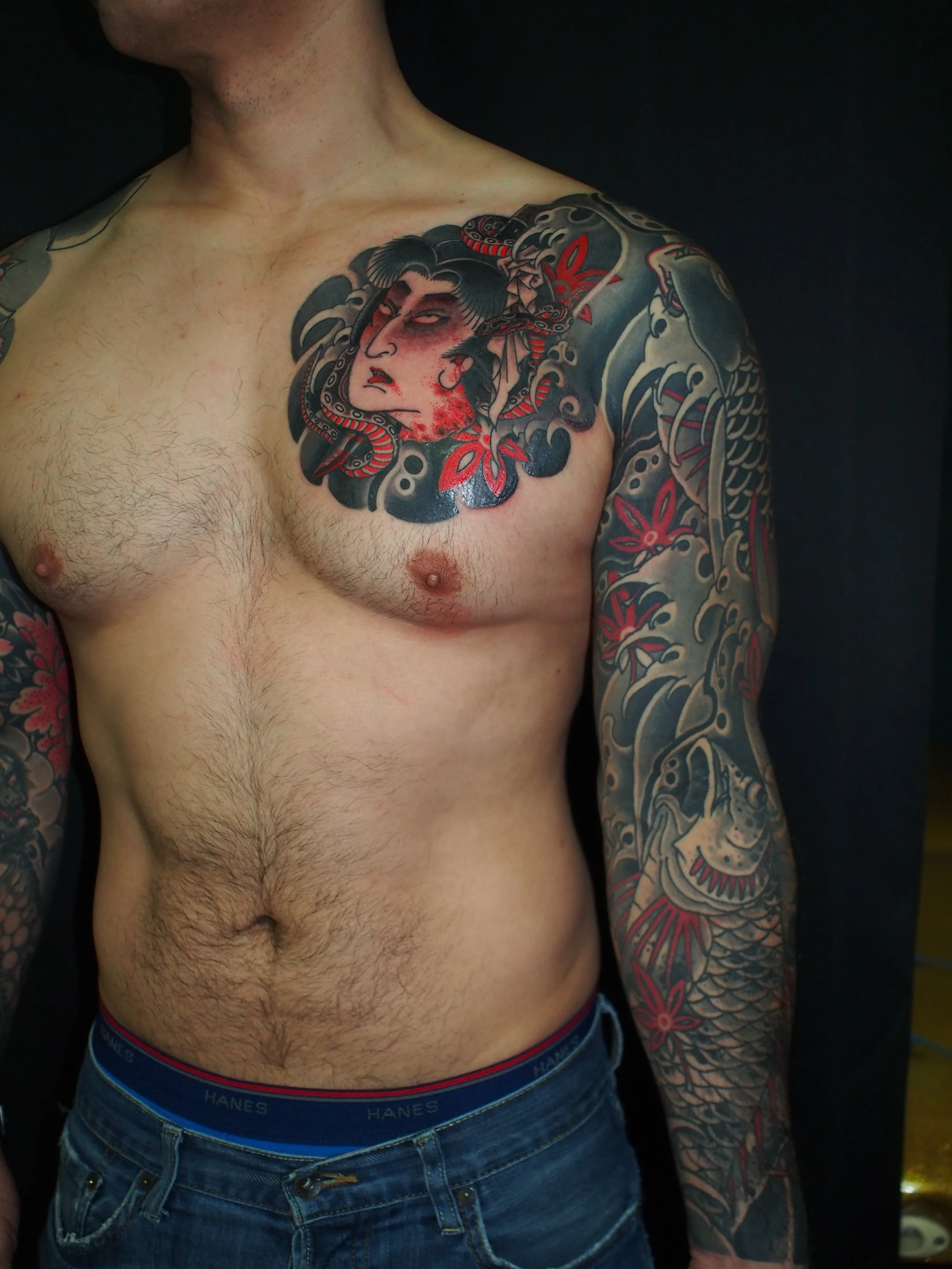 Japanese irezumi namakubi and koi sleeve tattoo by Dominic Vasquez at Superfly Tattoo in San Diego, California