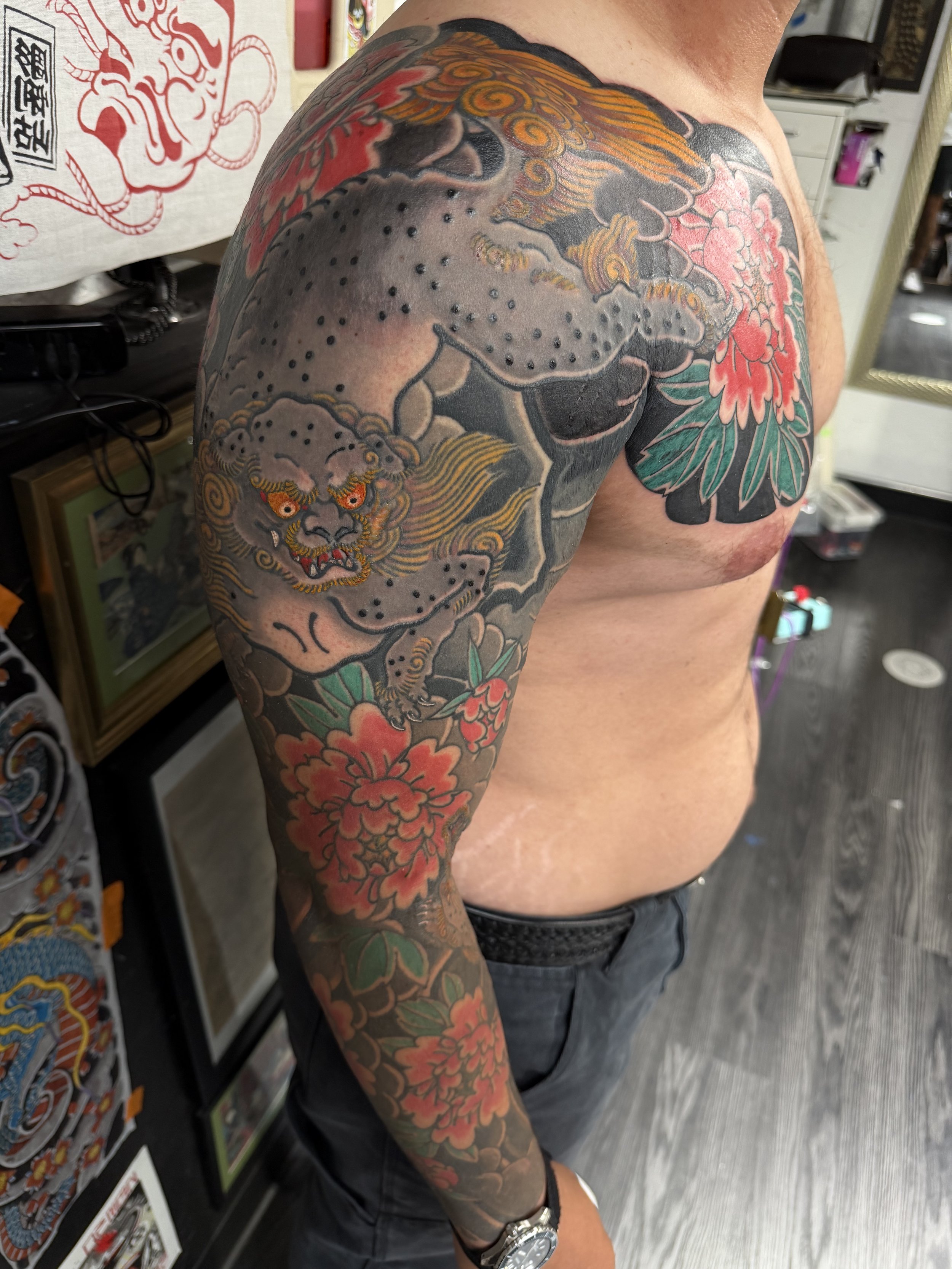 Japanese irezumi shi shi sleeve tattoo by Dominic Vasquez at Superfly Tattoo in San Diego, California
