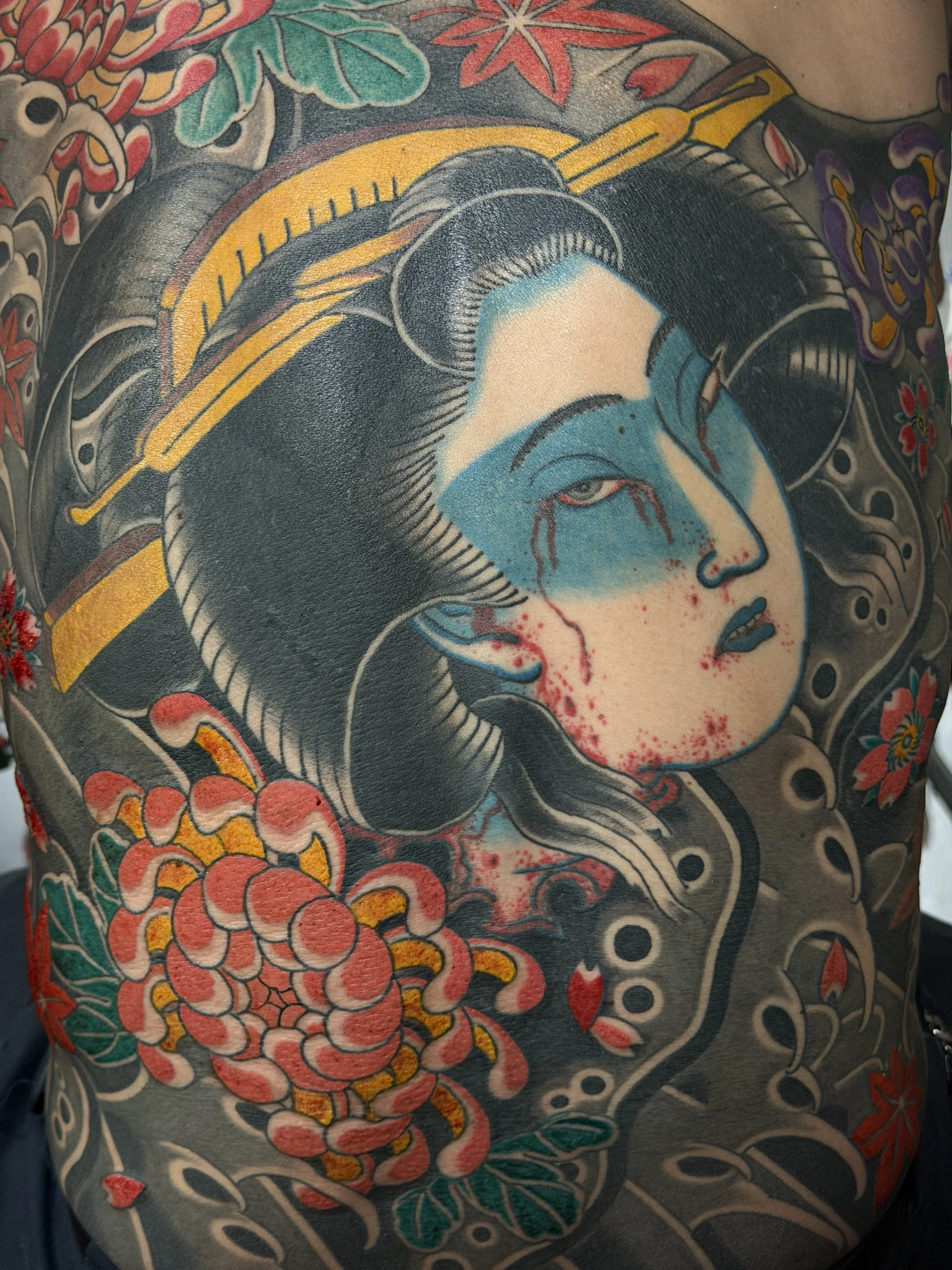 Japanese namakubi back tattoo by Dominic Vasquez at Superfly Tattoo in San Diego, California