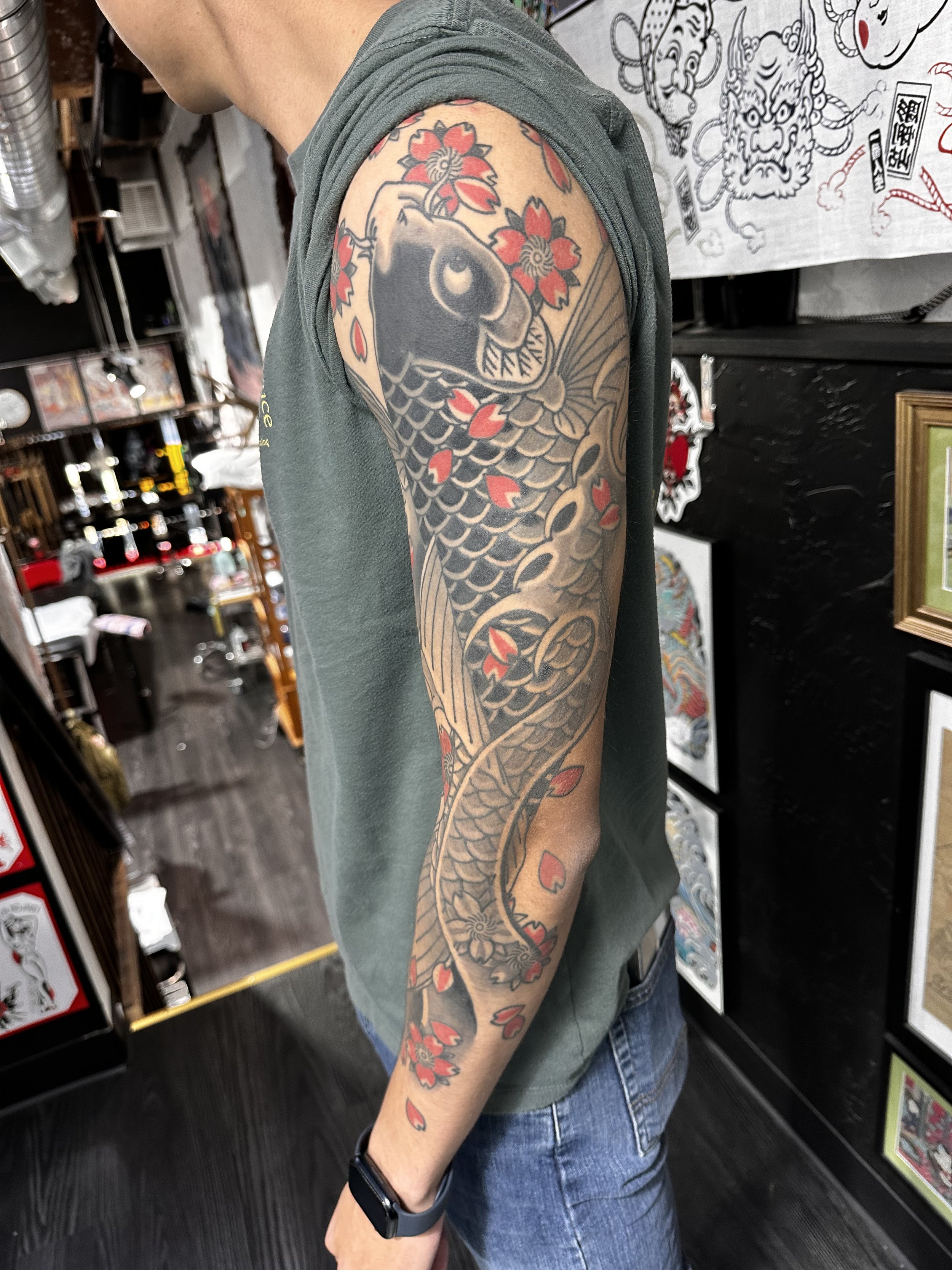 Japanese irezumi koi and cherry blossom sleeve tattoo by Dominic Vasquez at Superfly Tattoo in San Diego, California