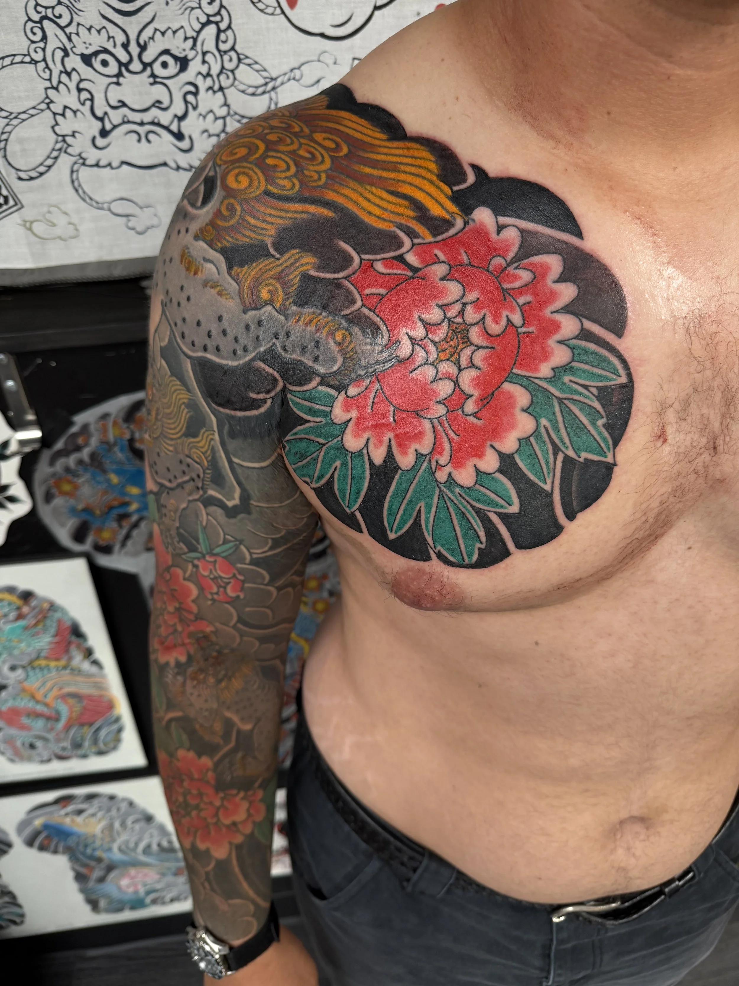 Japanese irezumi shi shi sleeve tattoo by Dominic Vasquez at Superfly Tattoo in San Diego, California