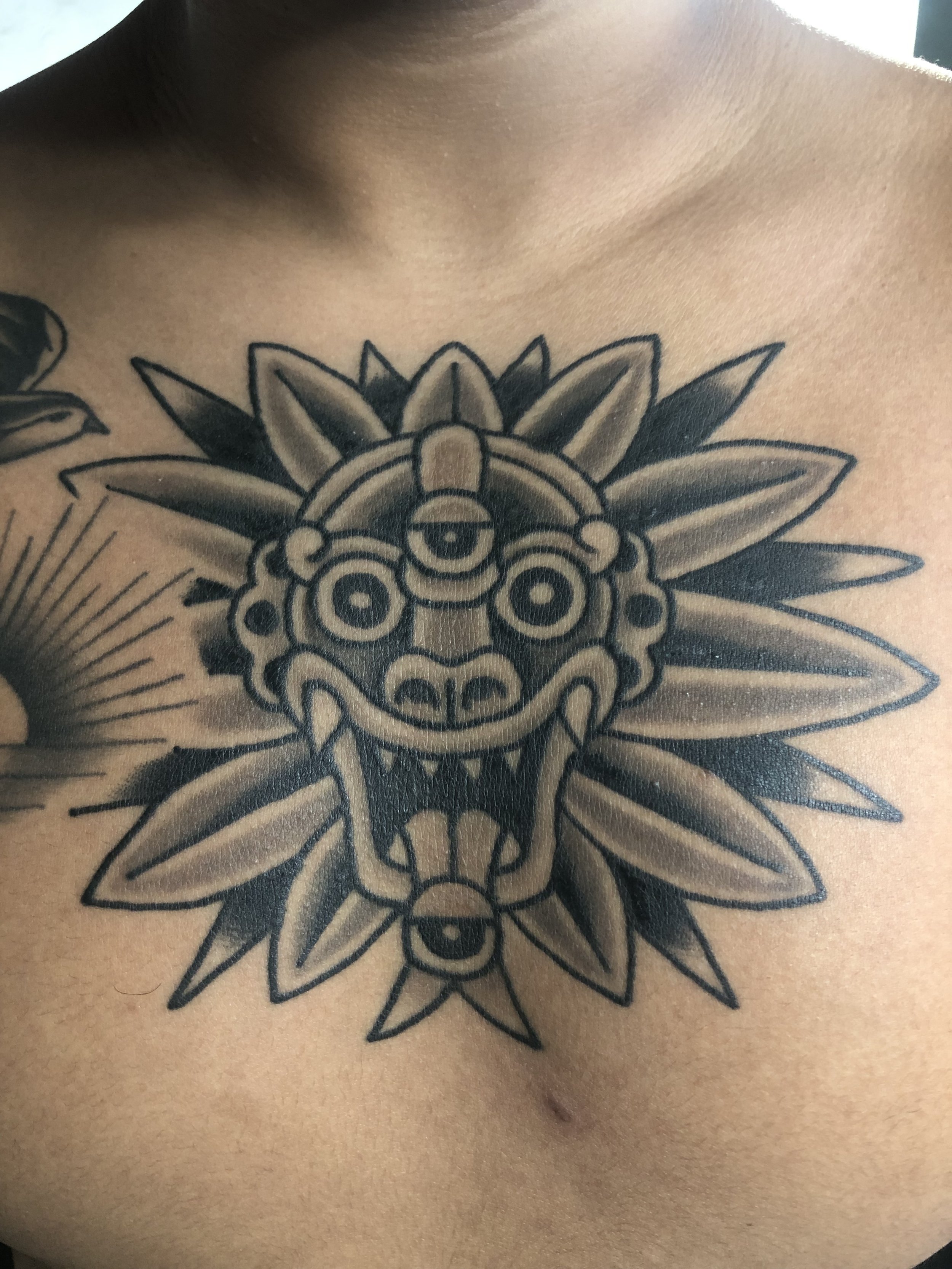 mexica aztec feathered serpent tattoo  by robert nava at Superfly Tattoo in San Diego, California