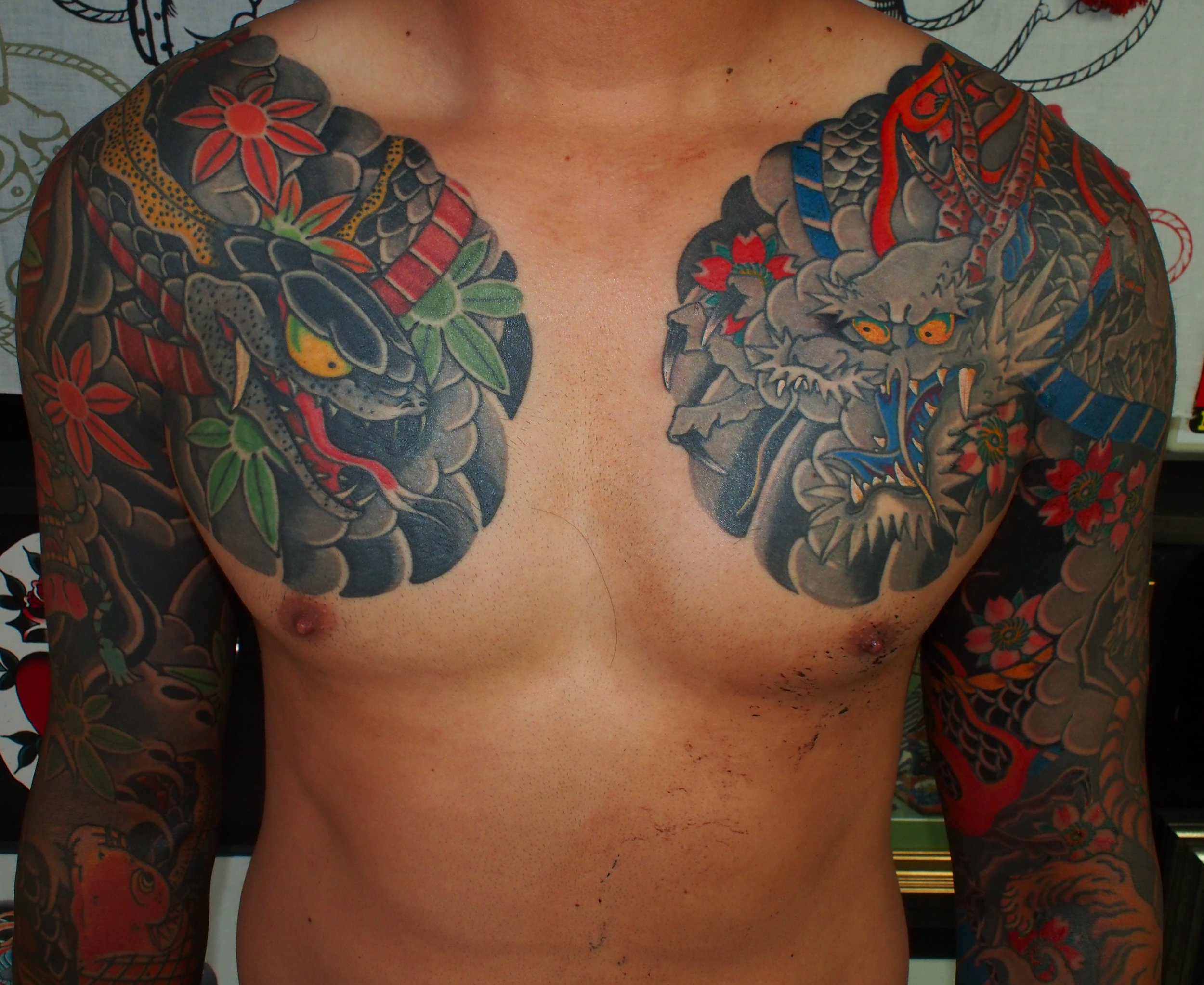 Japanese irezumi dragon and snake sleeve tattoos by Dominic Vasquez at Superfly Tattoo in San Diego, California