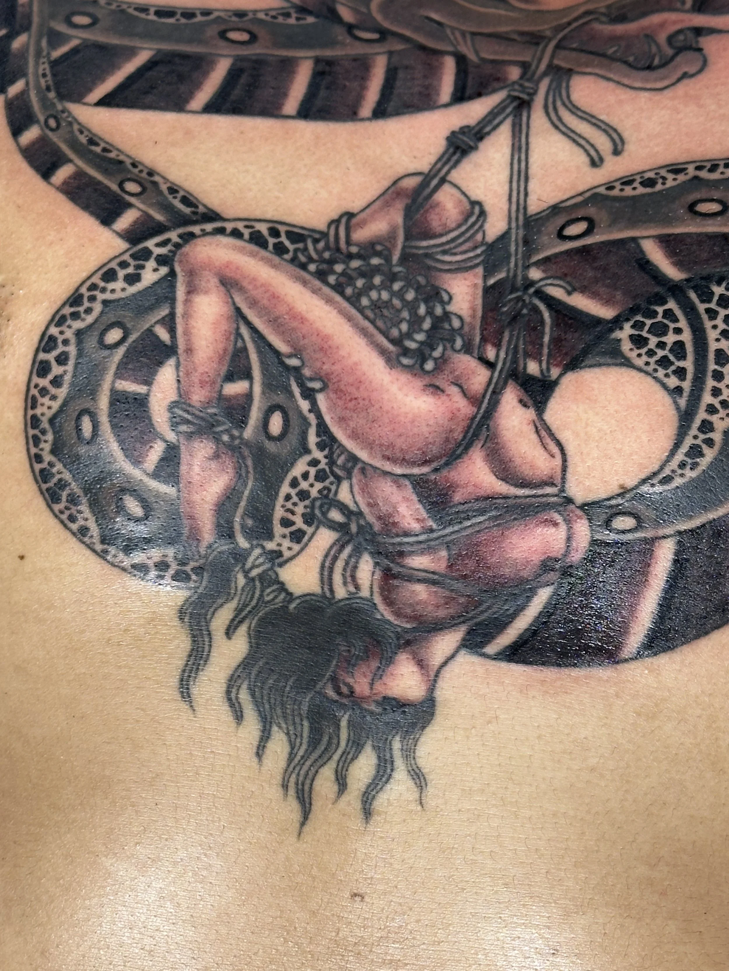 Japanese irezumi snake shibari chest tattoo by Dominic Vasquez at Superfly Tattoo in San Diego, California