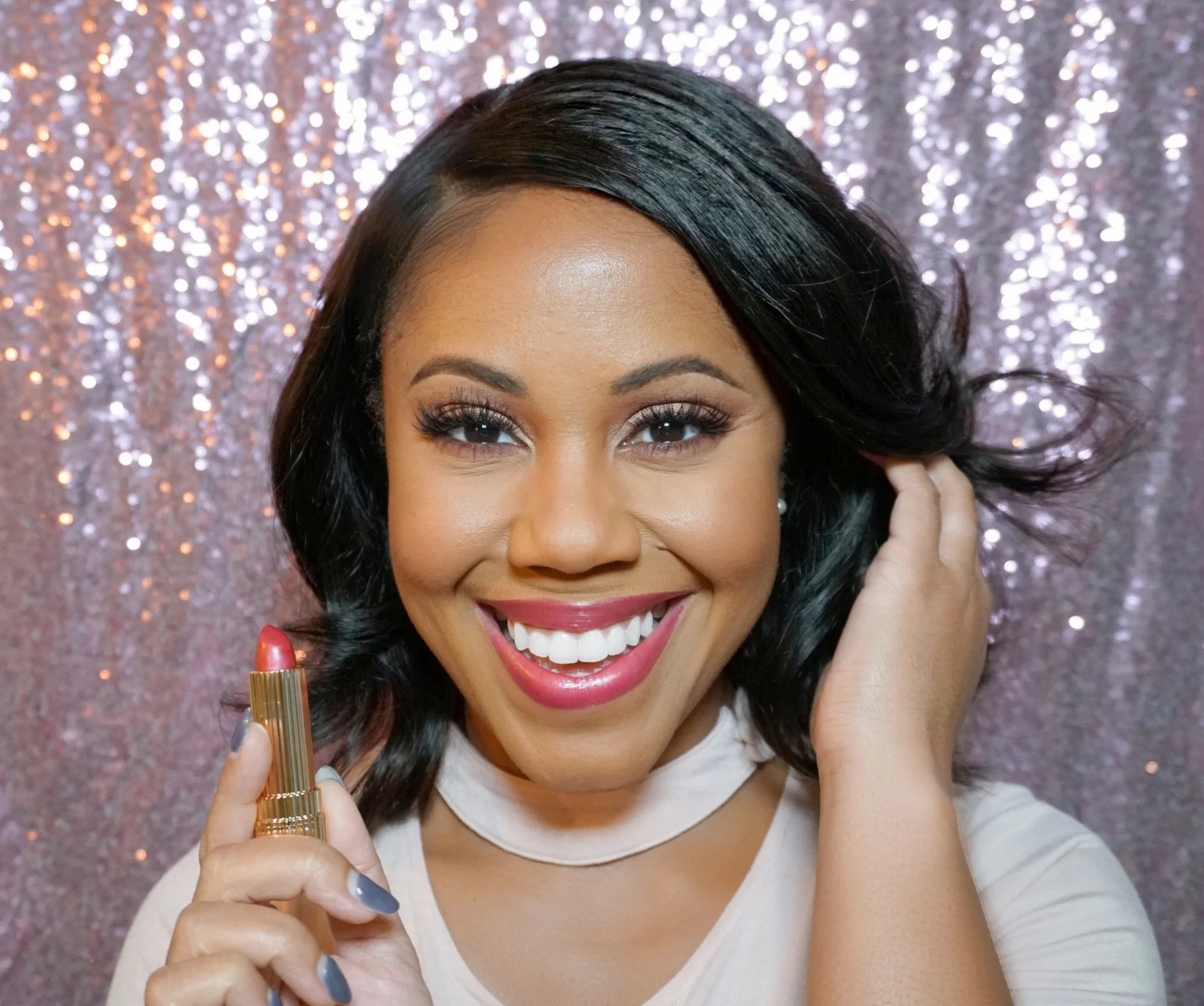 Shop this Pink Blouse. Shop this Pink Lipstick.