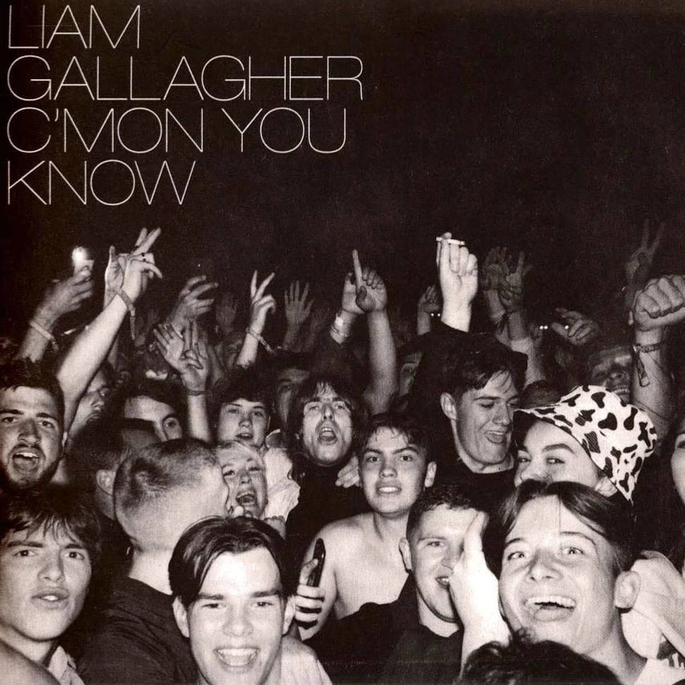Crowd of people at a music concert or party, some dancing and smiling, with Liam Gallagher's name and song title 'C'Mon You Know' in the upper left corner.