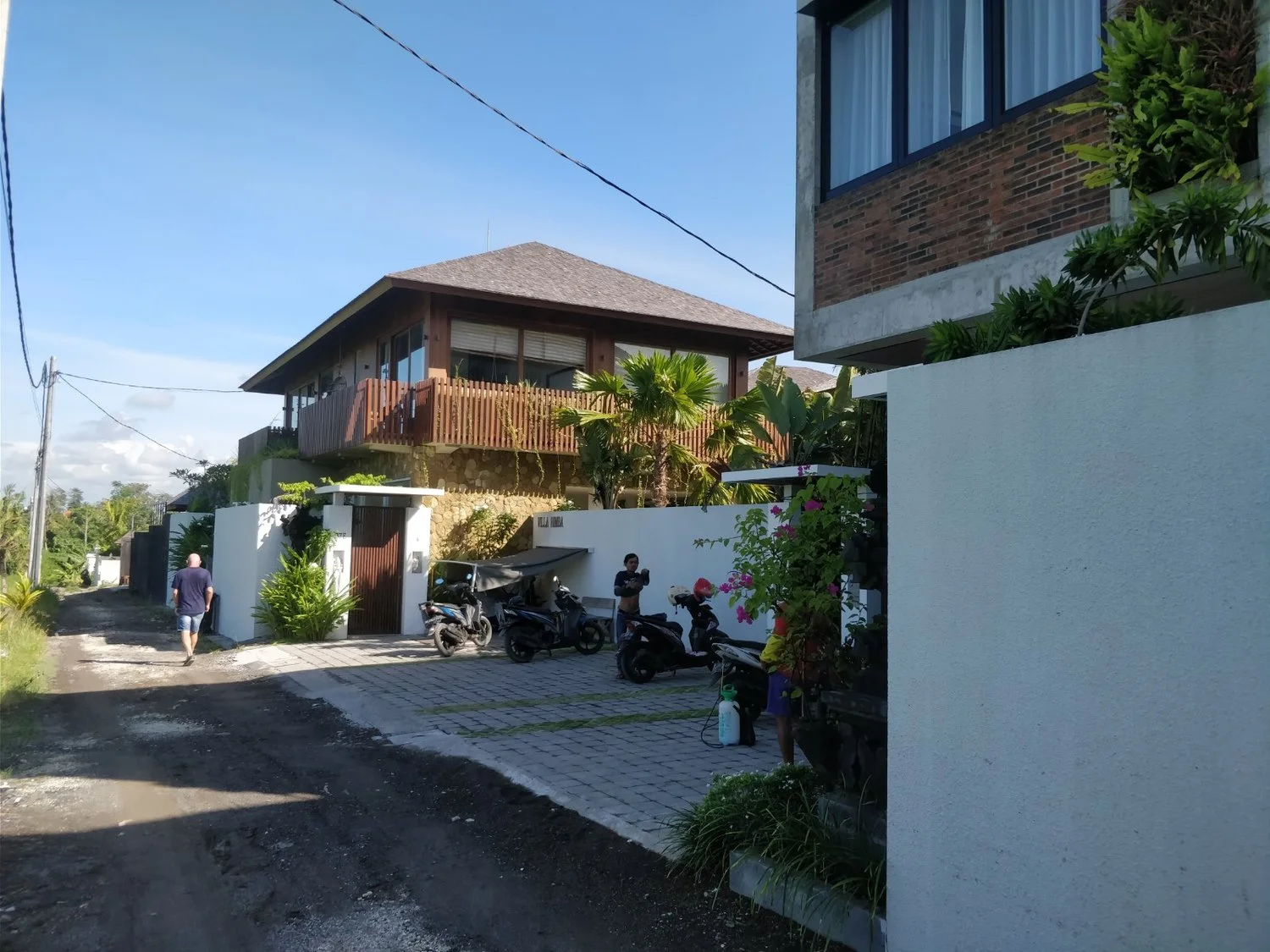 After you turn down the gang The villa parking is the first parking area on your right. Stop here!