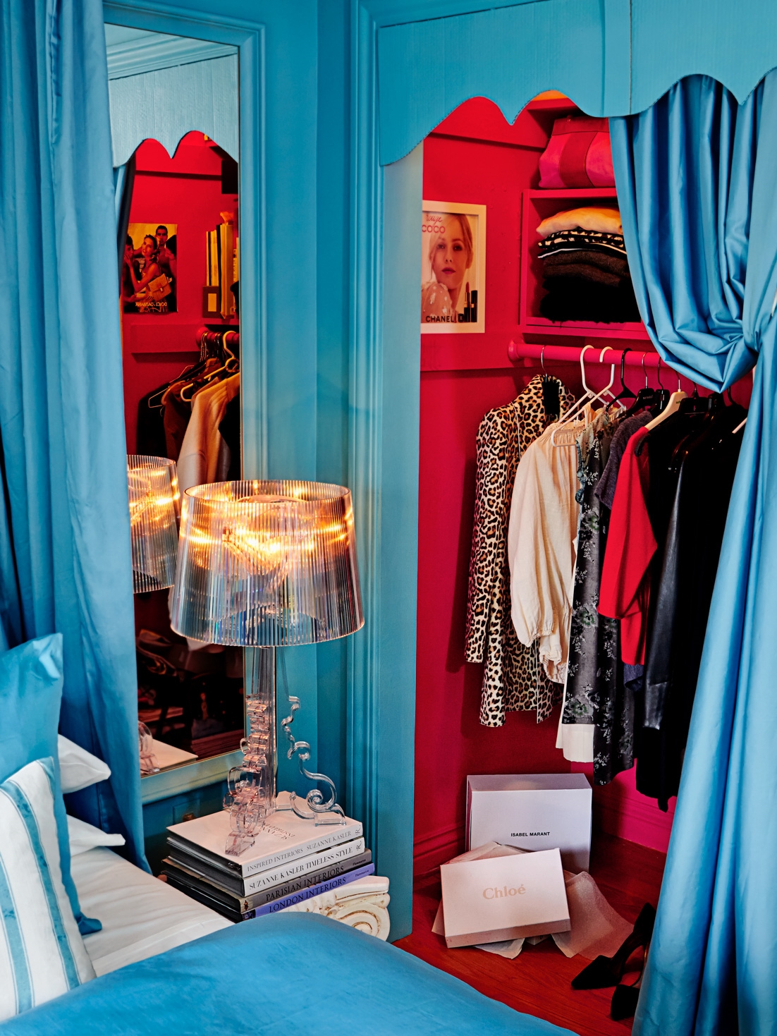 The closet was painted bight pink for a bit of pop! The Bourgie lamp provides contemporary baroque lighting.