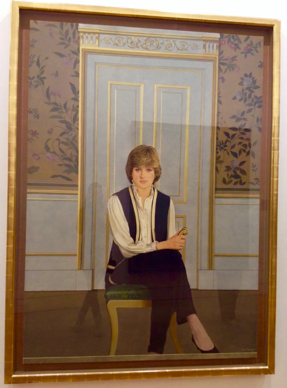 A portrait of Lady Diana Spencer, as this was painted during her engagement to Charles, so she wasn't Lady Di yet. I like the the interior setting (duh, interiors) and the subtle frankness of her pose.