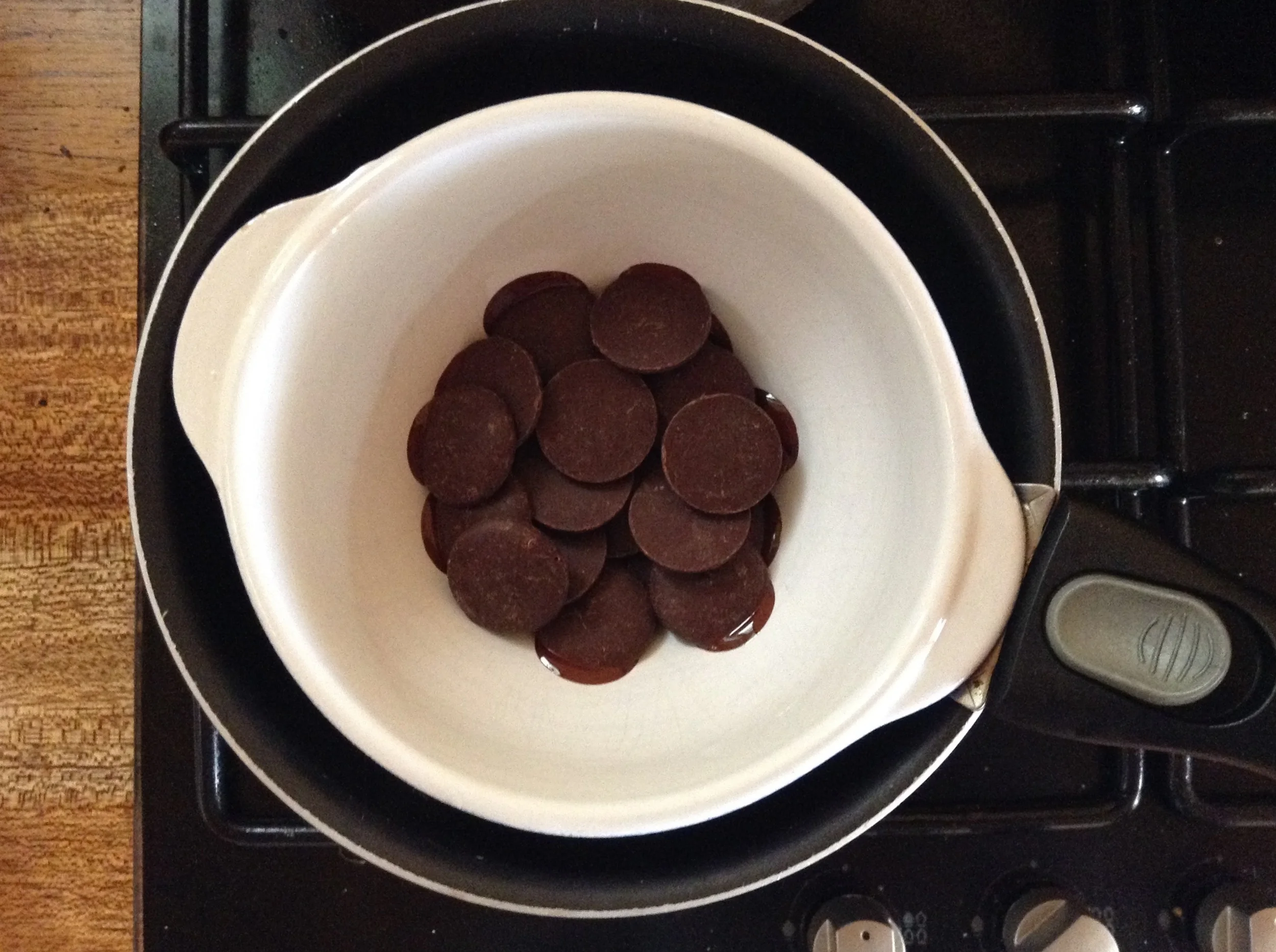 Melt the Cacao Paste Wafers in an improvised double boiler or a real one if you have it. And congrats you, if you do. Otherwise, get crafty so you don't hurt your chocolate.