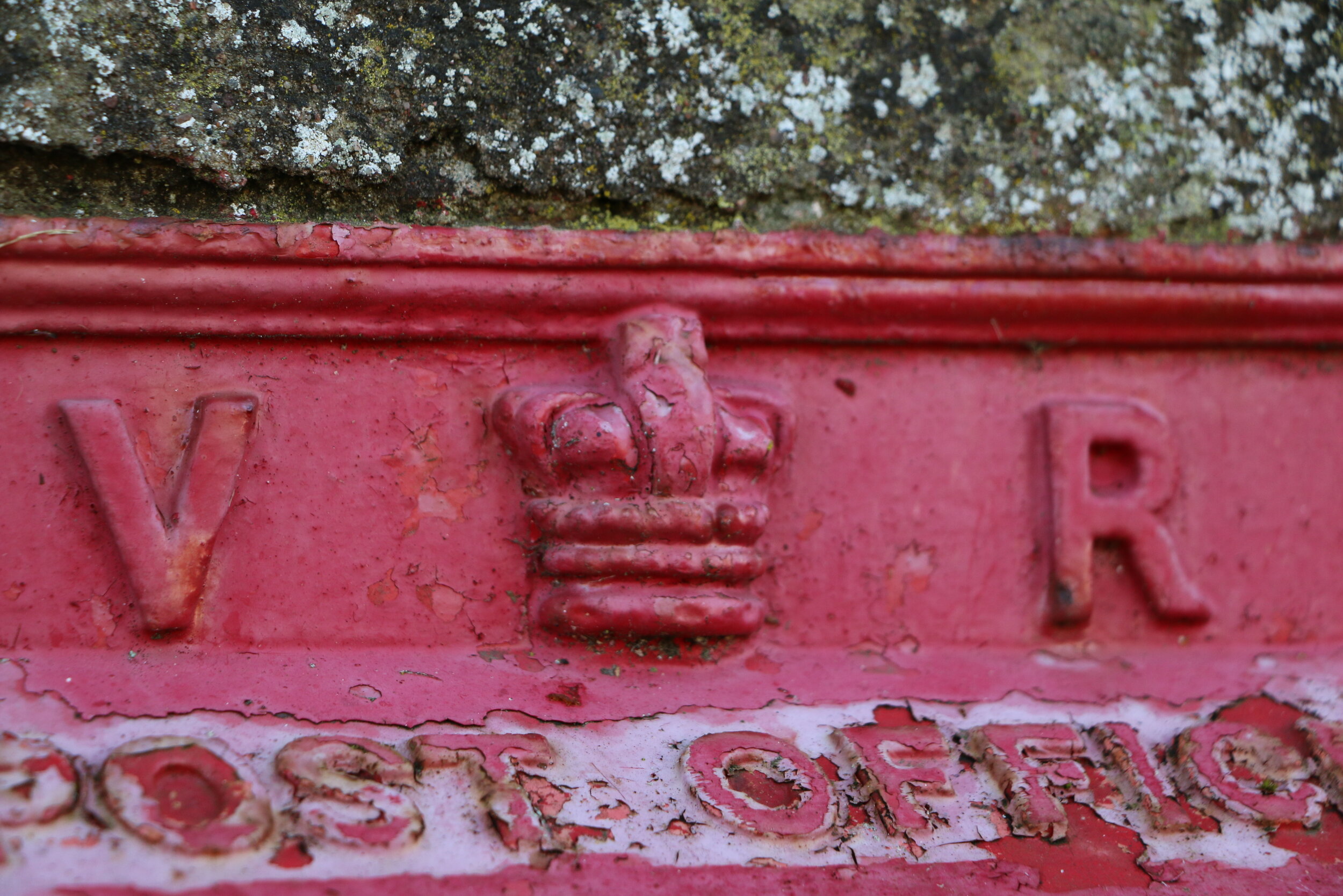 A decomissioned post office box from the reign of Queen Victoria in my sister's garden wall. Nairn, Scotland.