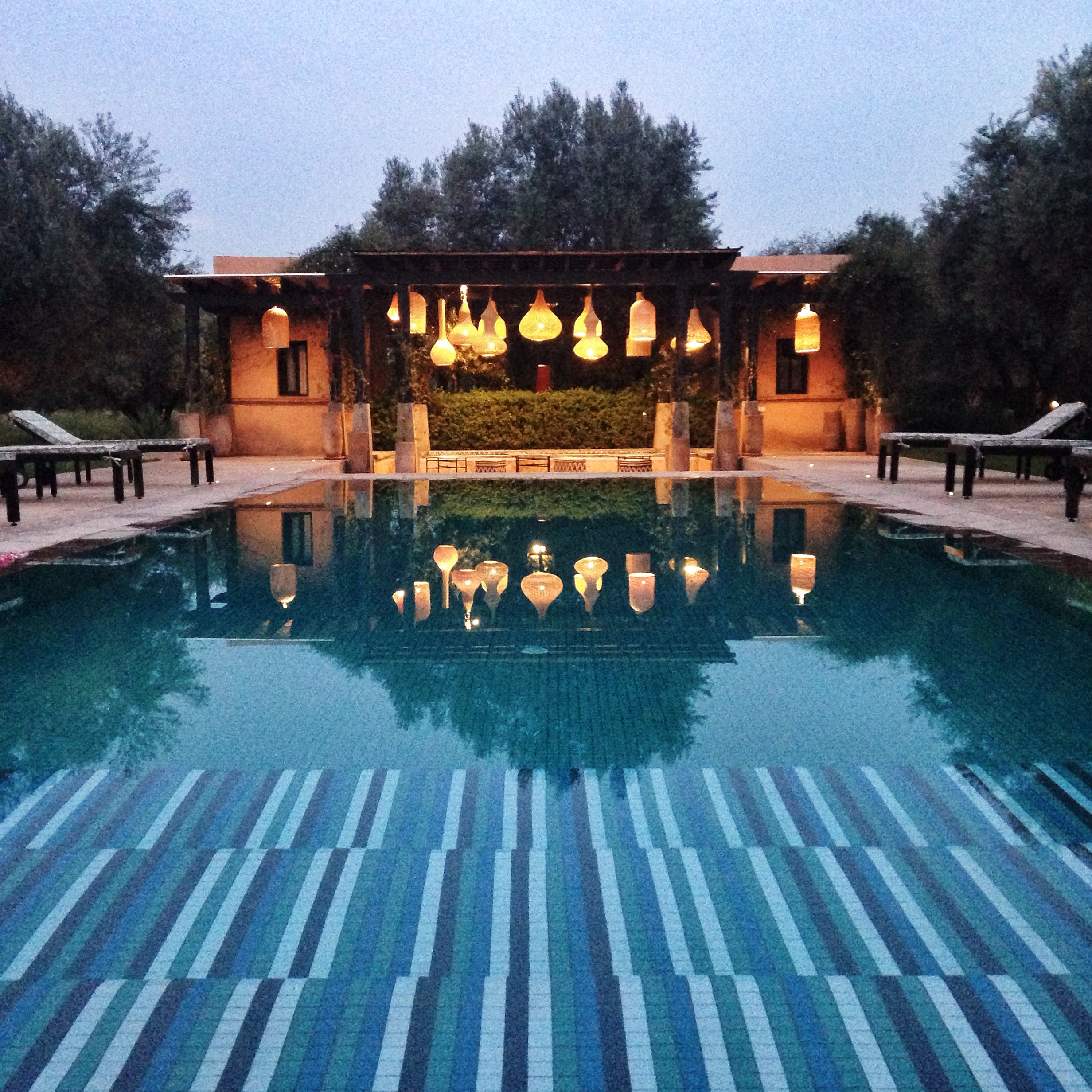 Evening Pool with Lanterns Peacock Pavilions  | EAT.PRAY.MOVE Yoga Retreat | Marrakesh, Morocco