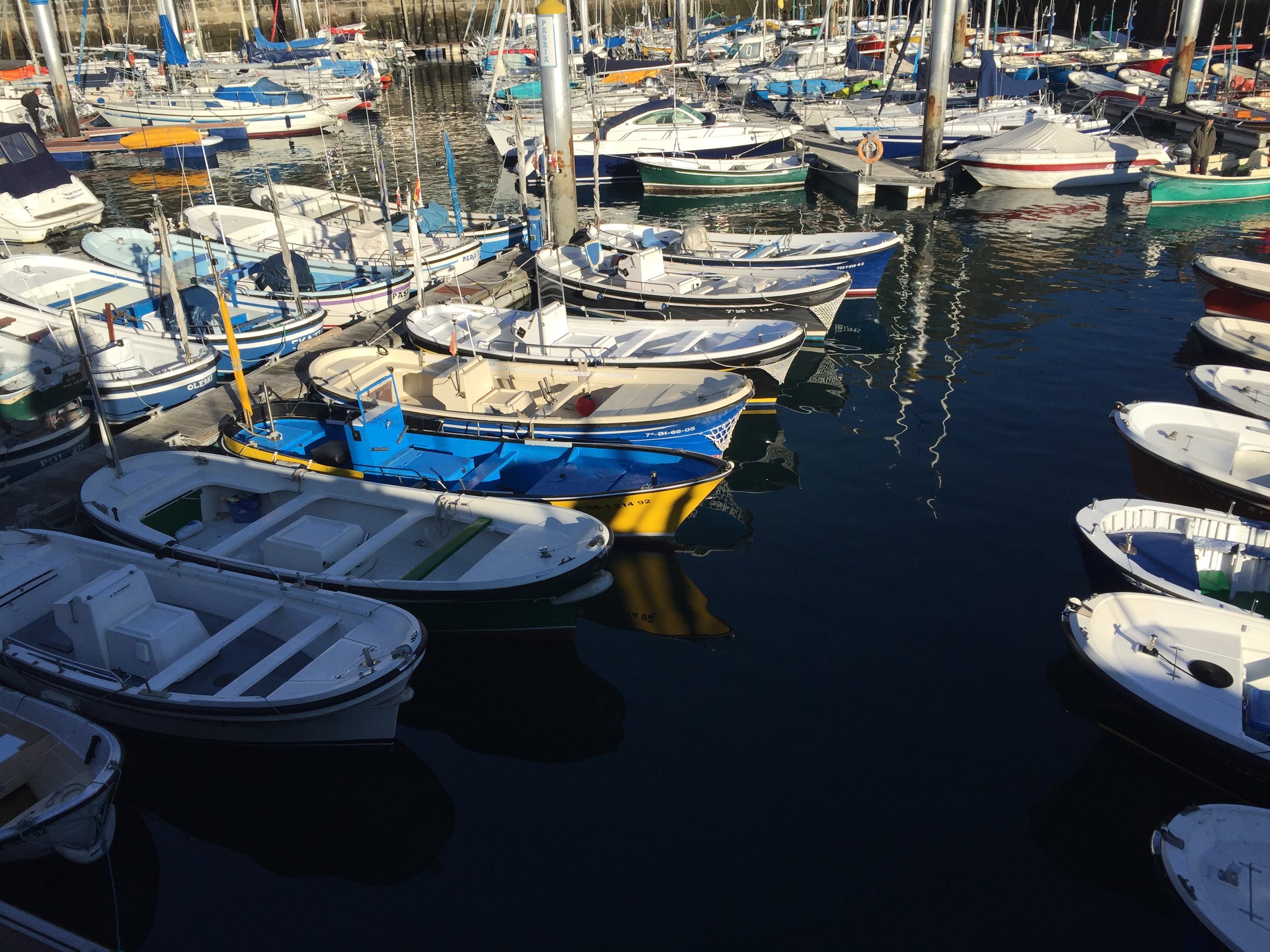 Boats lined up in the waterways | EAT.PRAY.MOVE Retreats | Basque Country, Spain