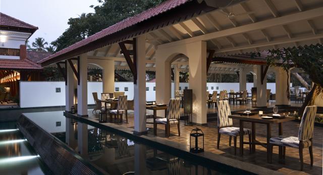 Dining area surrounded by still pools | EAT.PRAY.MOVE Retreats | Goa, India