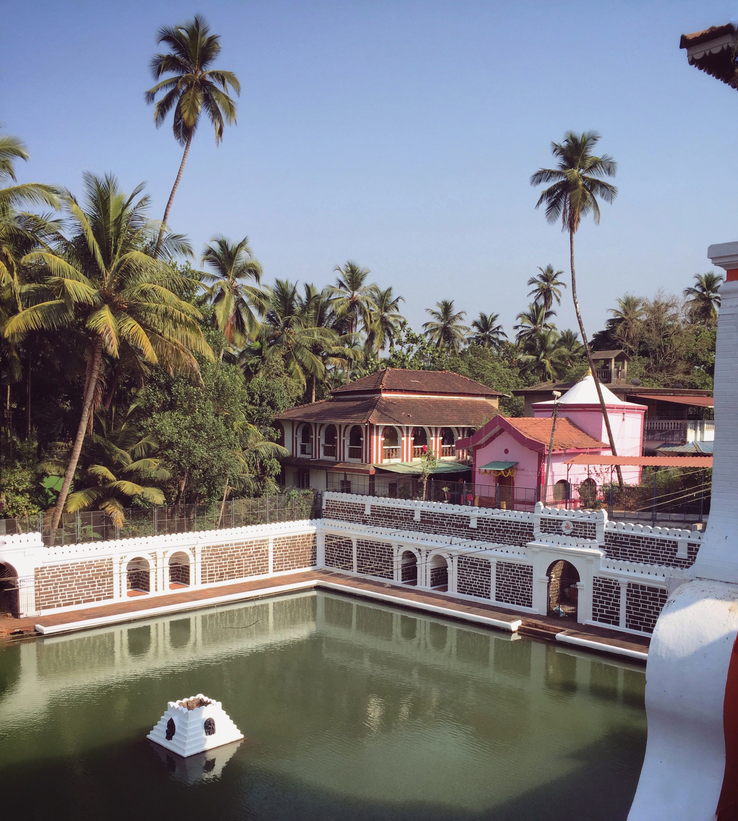 Pink walls at the temple | EAT.PRAY.MOVE Retreats | Goa, India