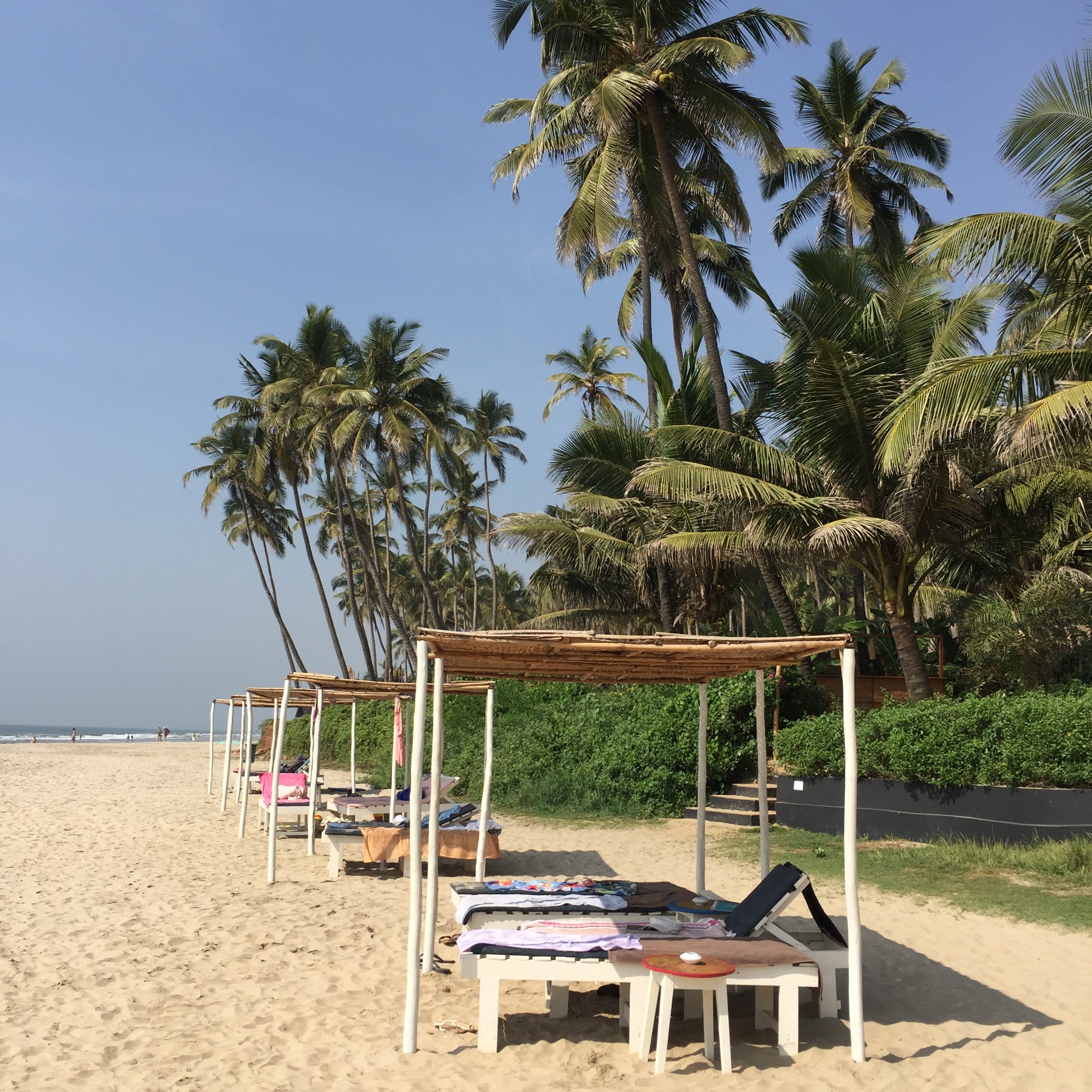 Loungers on the beach | EAT.PRAY.MOVE Retreats | Goa, India