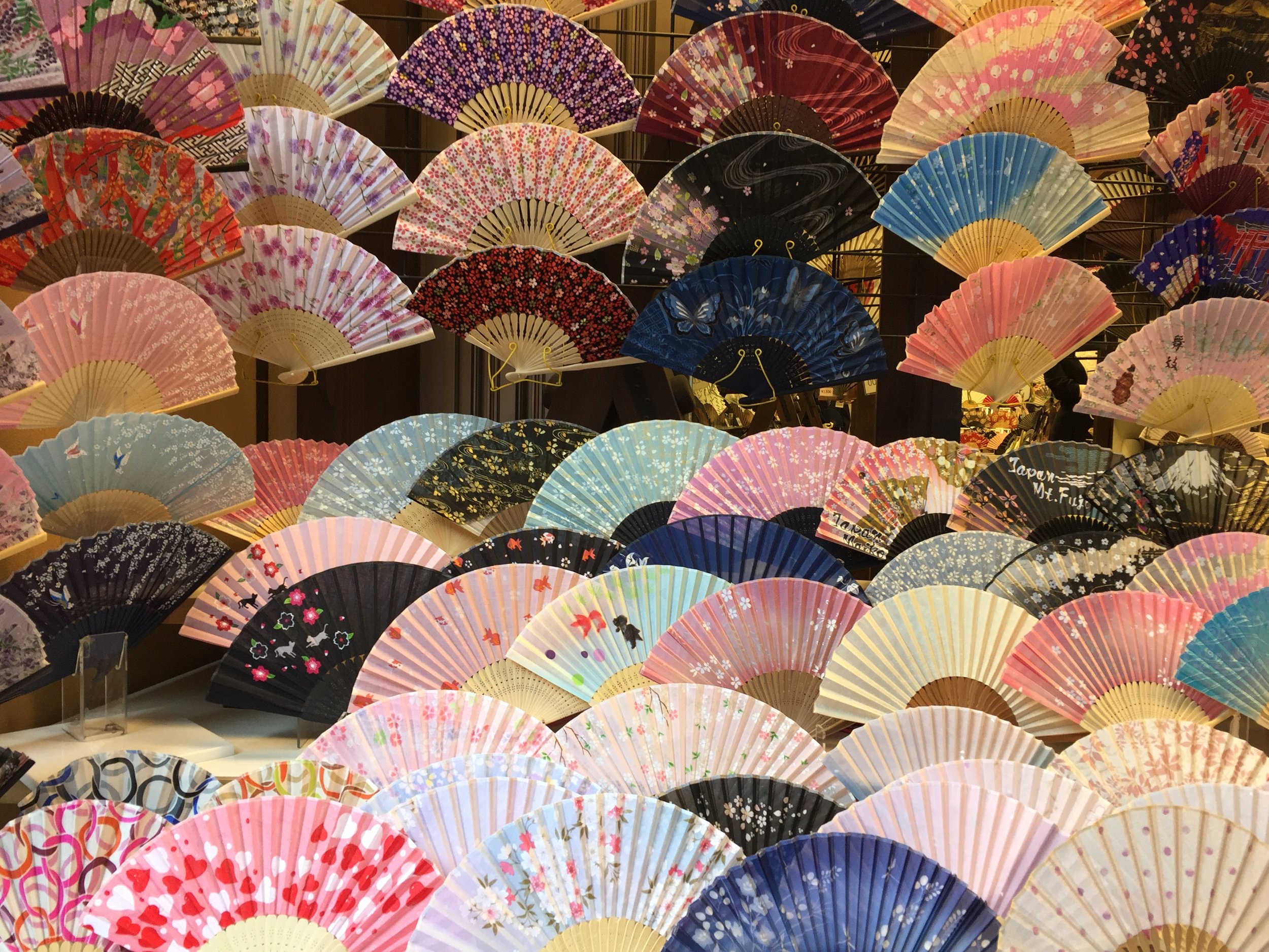 Colorful patterned fans | EAT.PRAY.MOVE Yoga | Kyoto, Japan
