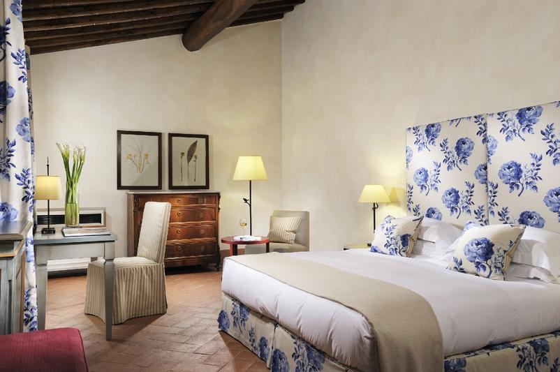 Wooden beamed bedroom Castello del Nero | EAT.PRAY.MOVE Yoga | Chianti, Italy