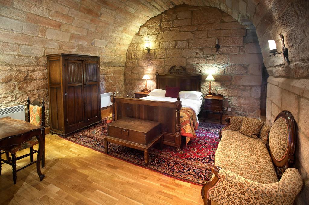 Stone walled bedroom Dalhousie Castle | EAT.PRAY.MOVE Yoga | Edinburgh, Scotland