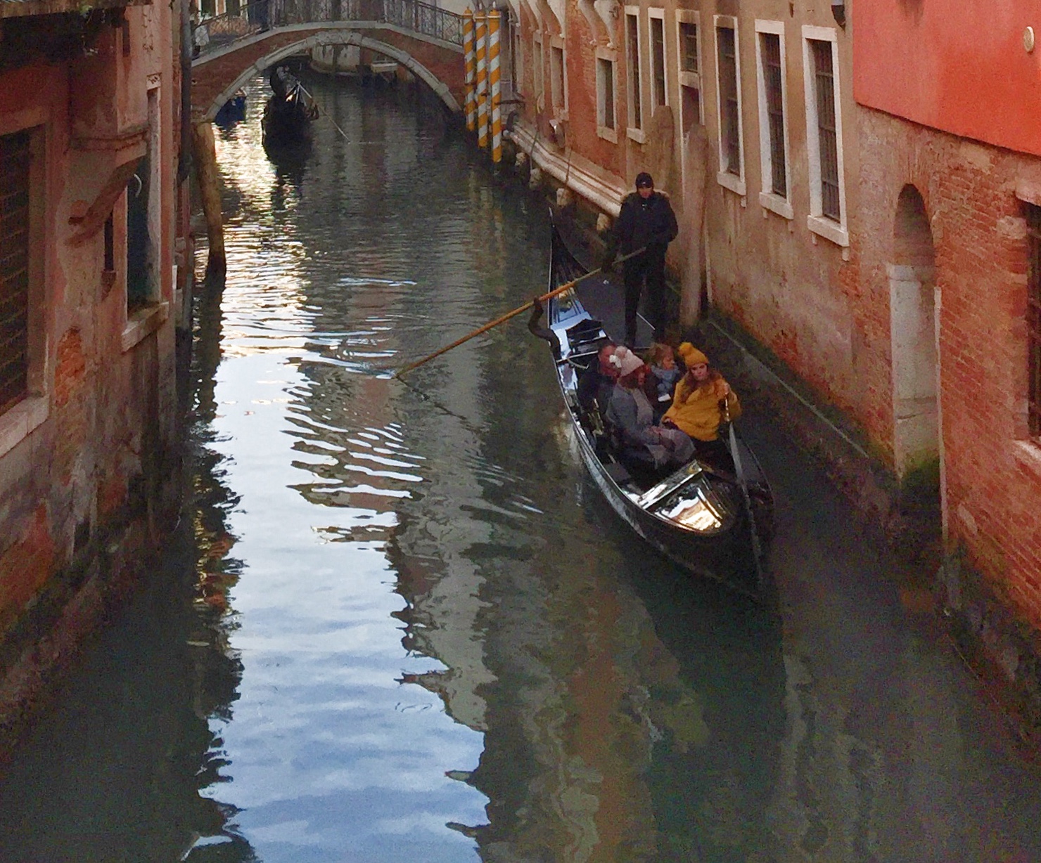 Gondolier in calm waters  | EAT.PRAY.MOVE Yoga | Venice, Italy