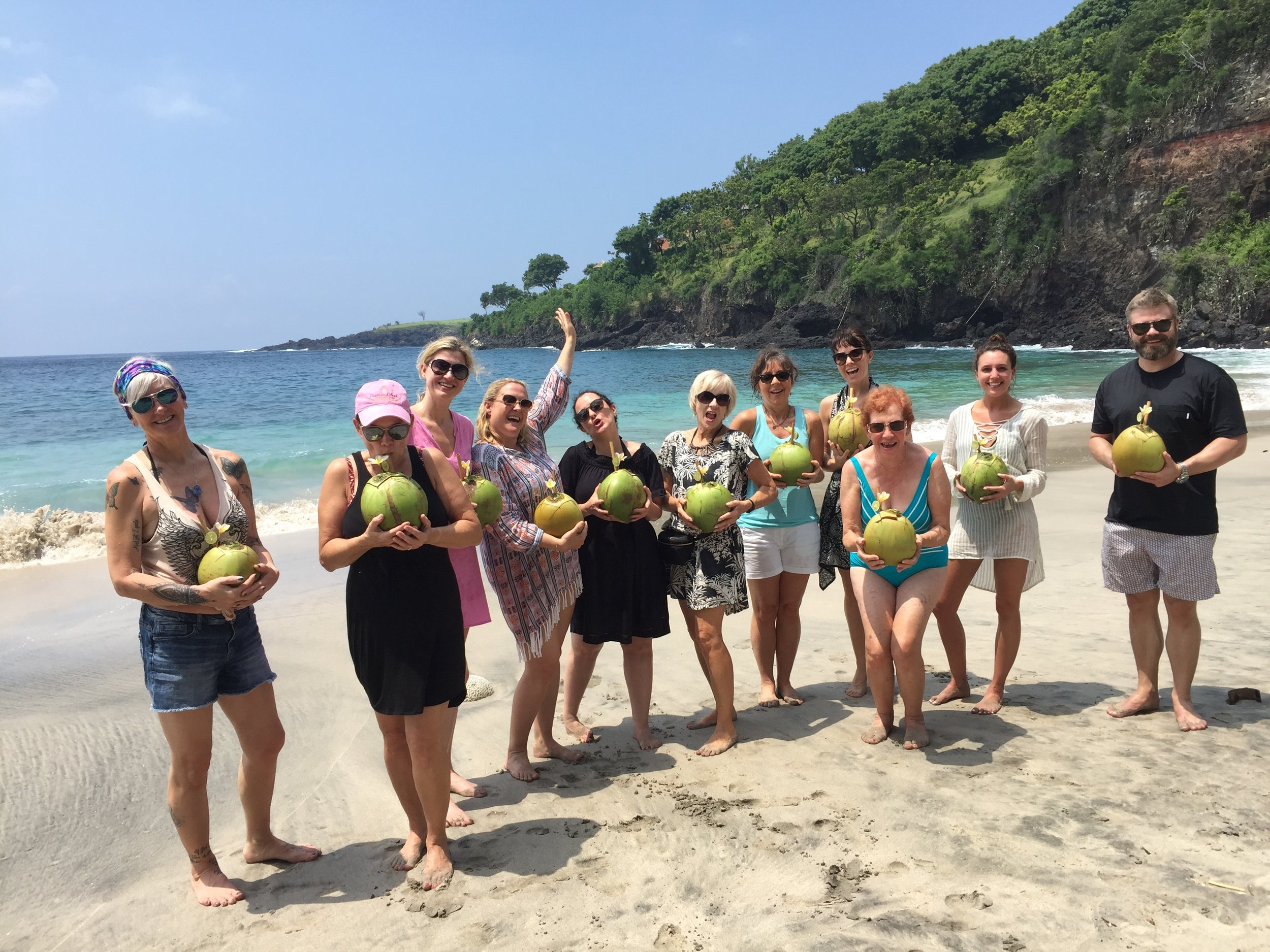 Drinking from coconuts on the beach | EAT.PRAY.MOVE Yoga | Bali, Indonesia