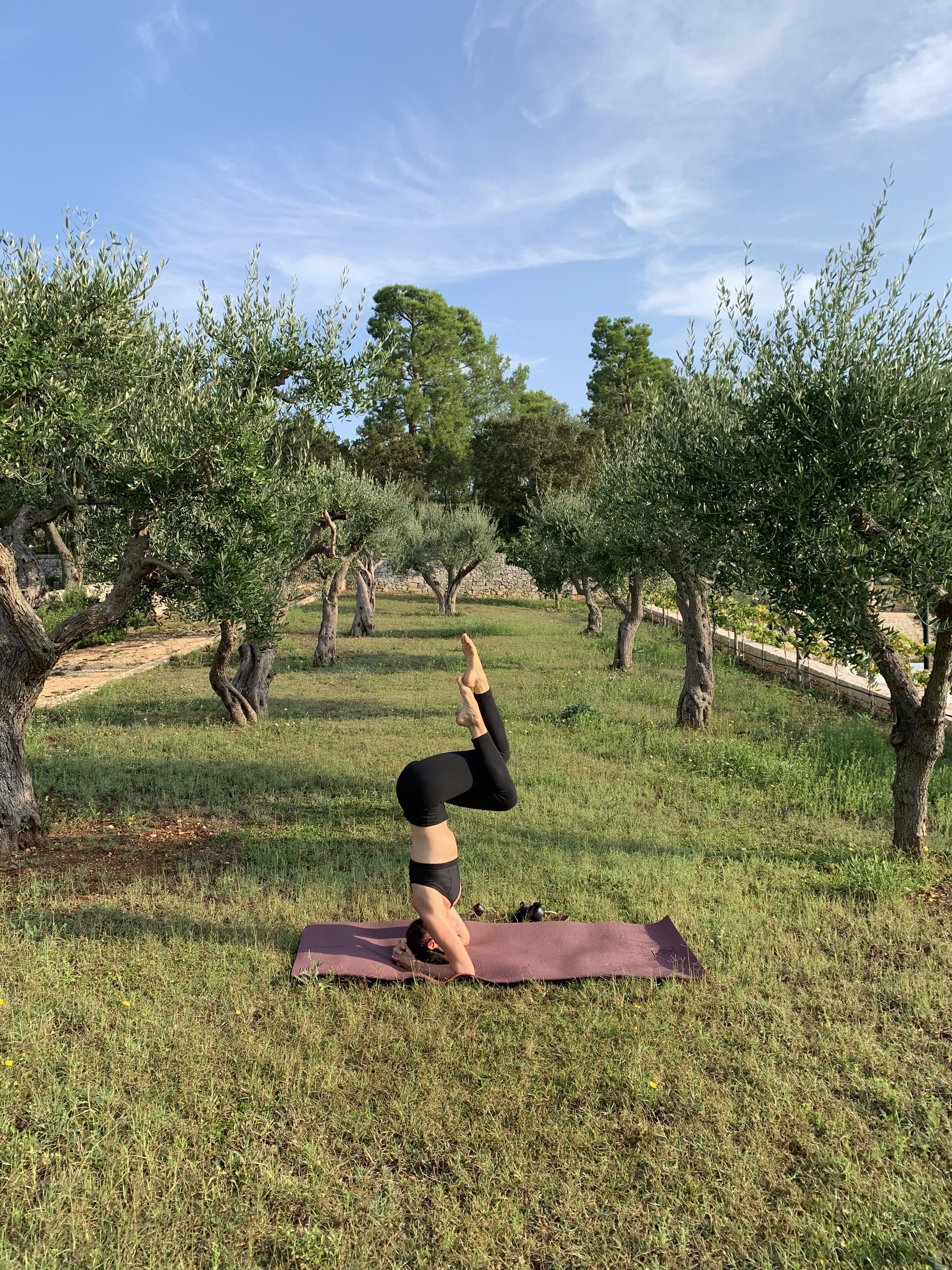 Inversions on the Ottolire grounds | EAT.PRAY.MOVE Yoga Retreats | Puglia, Italy