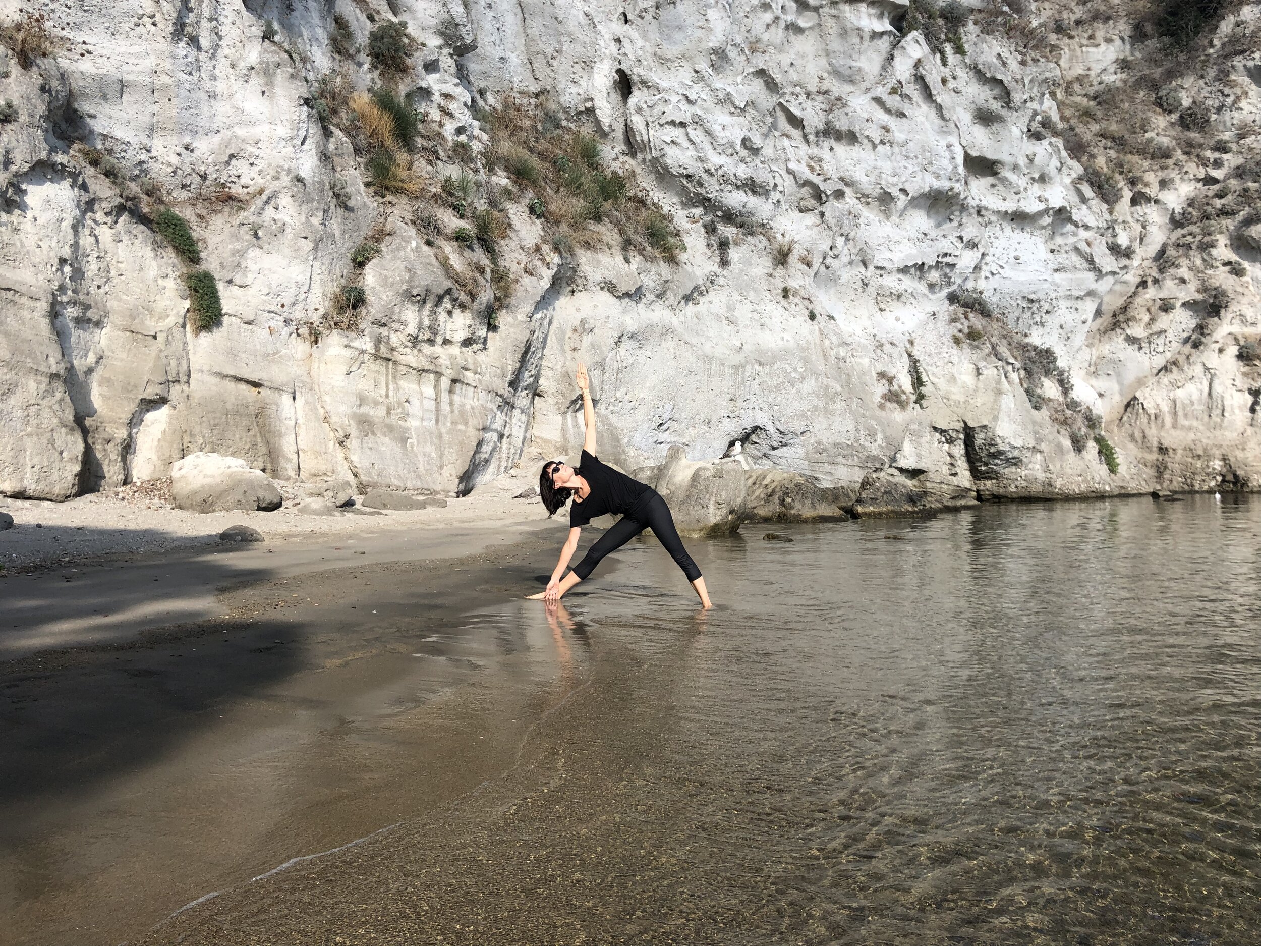 Triangle pose in Ischia | EAT.PRAY.MOVE Yoga Retreats | Ischia, Italy