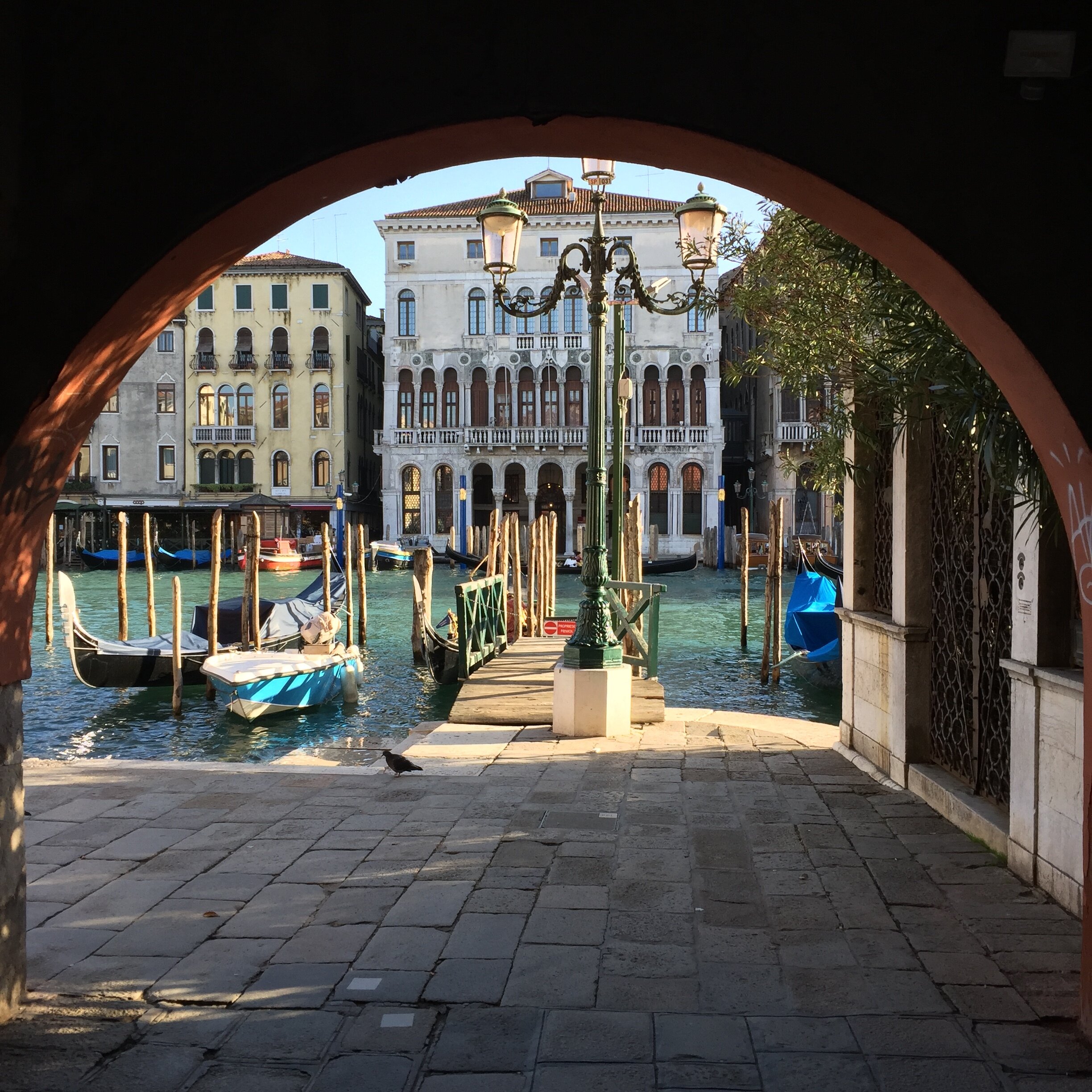 Out of a corridor and onto the canal | EAT.PRAY.MOVE Retreats | Venice, Italy 