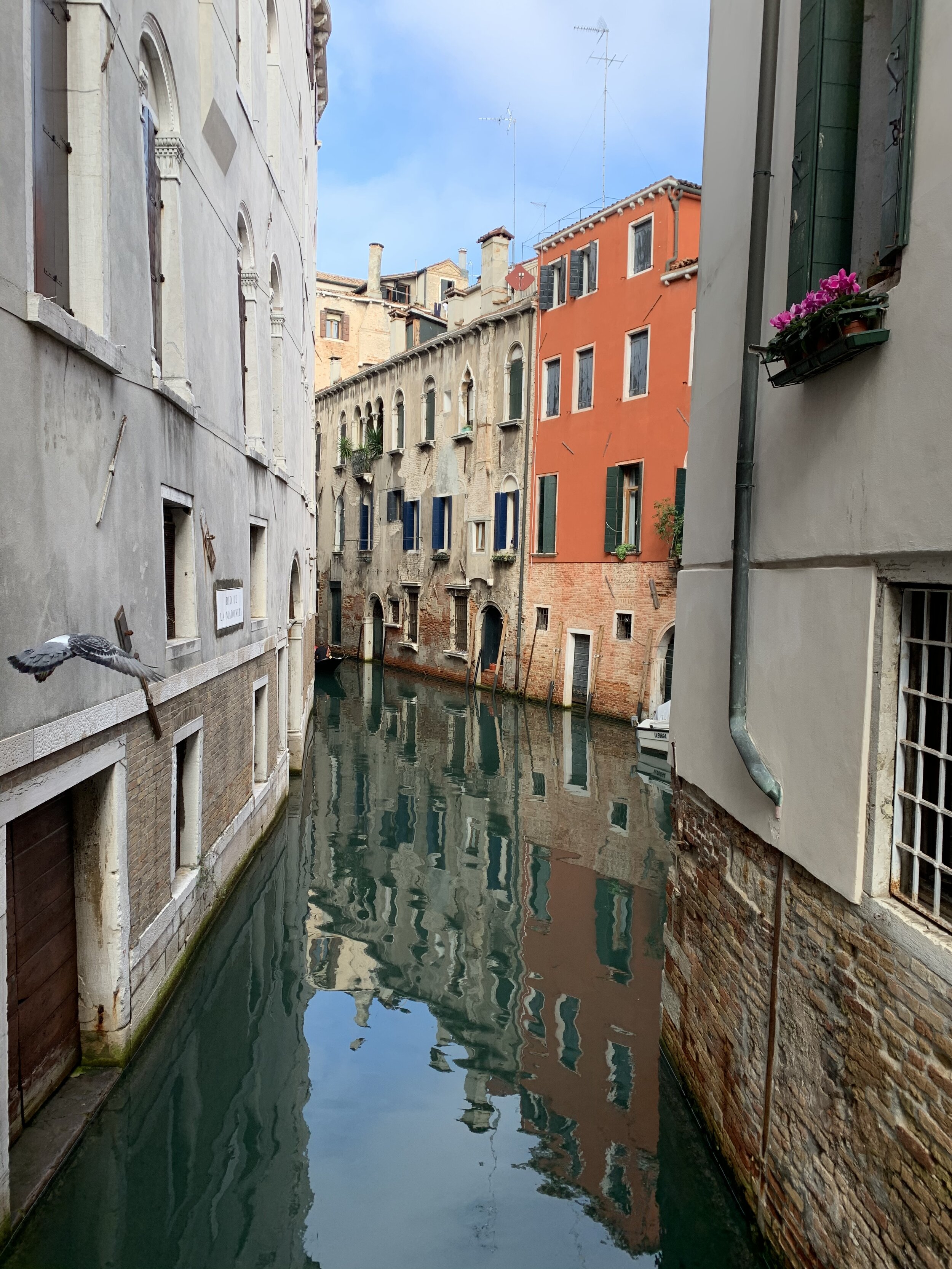 The oranges and teals of Venice | EAT.PRAY.MOVE Retreats | Venice, Italy 
