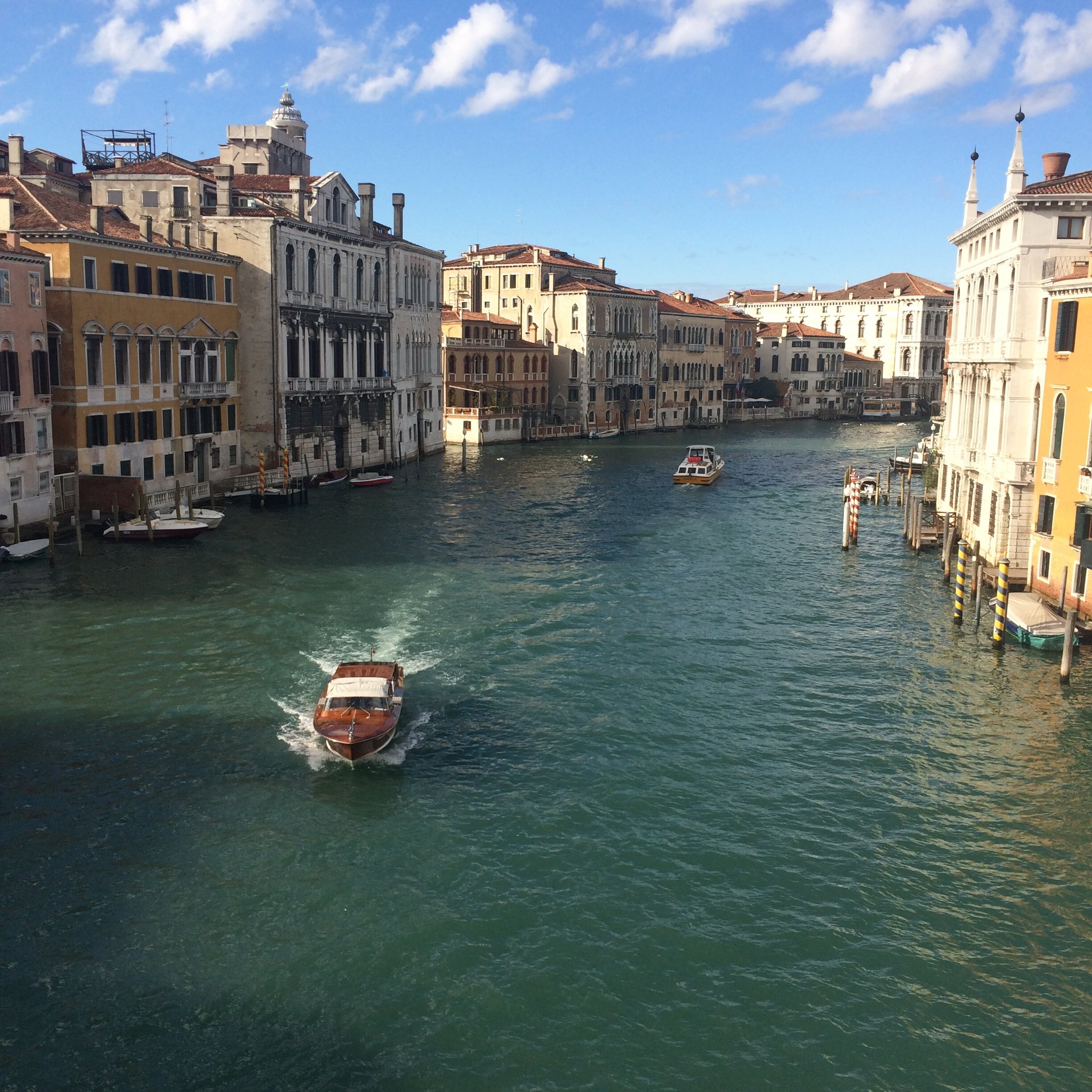 Classic boat on the Grand Canal | EAT.PRAY.MOVE Retreats | Venice, Italy 