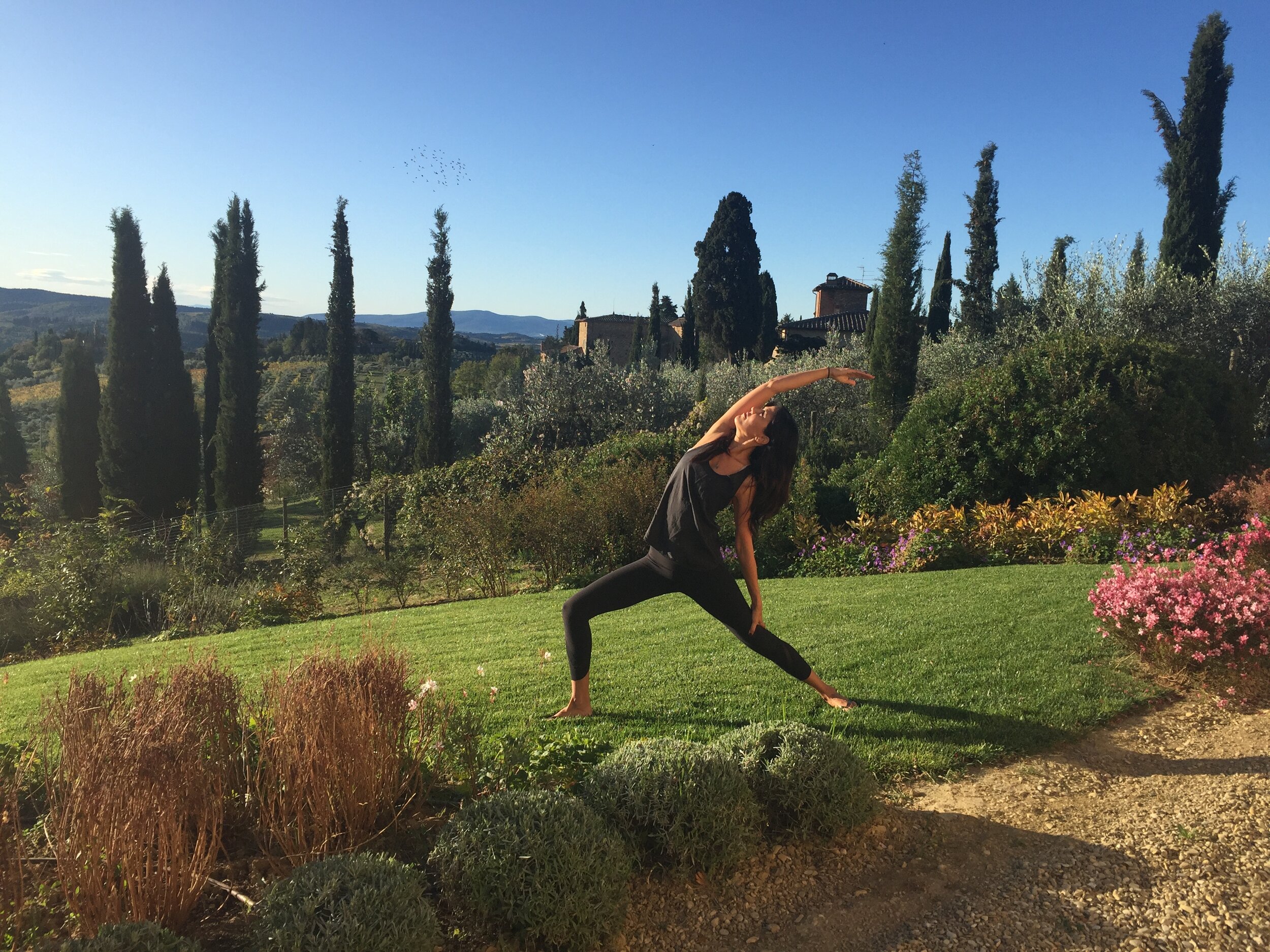 Warrior pose on retreat in Chianti, Italy 