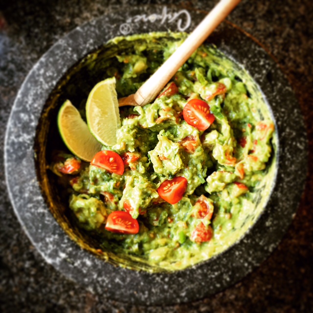 Hibiscus Dinners finger food: Mexican guacamole made in the mortar (molcajete) in the traditional way