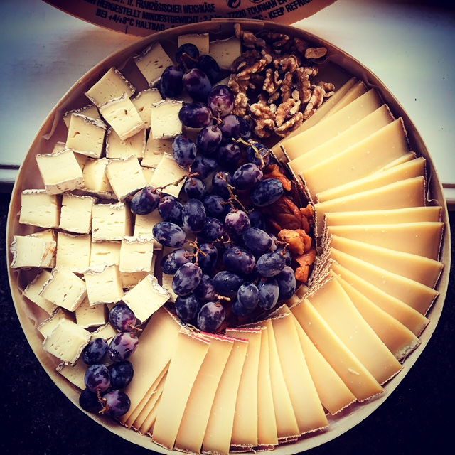 Hibiscus Dinners cheese plate: French, Italian or Norwegian cheese selection with nuts and jam.