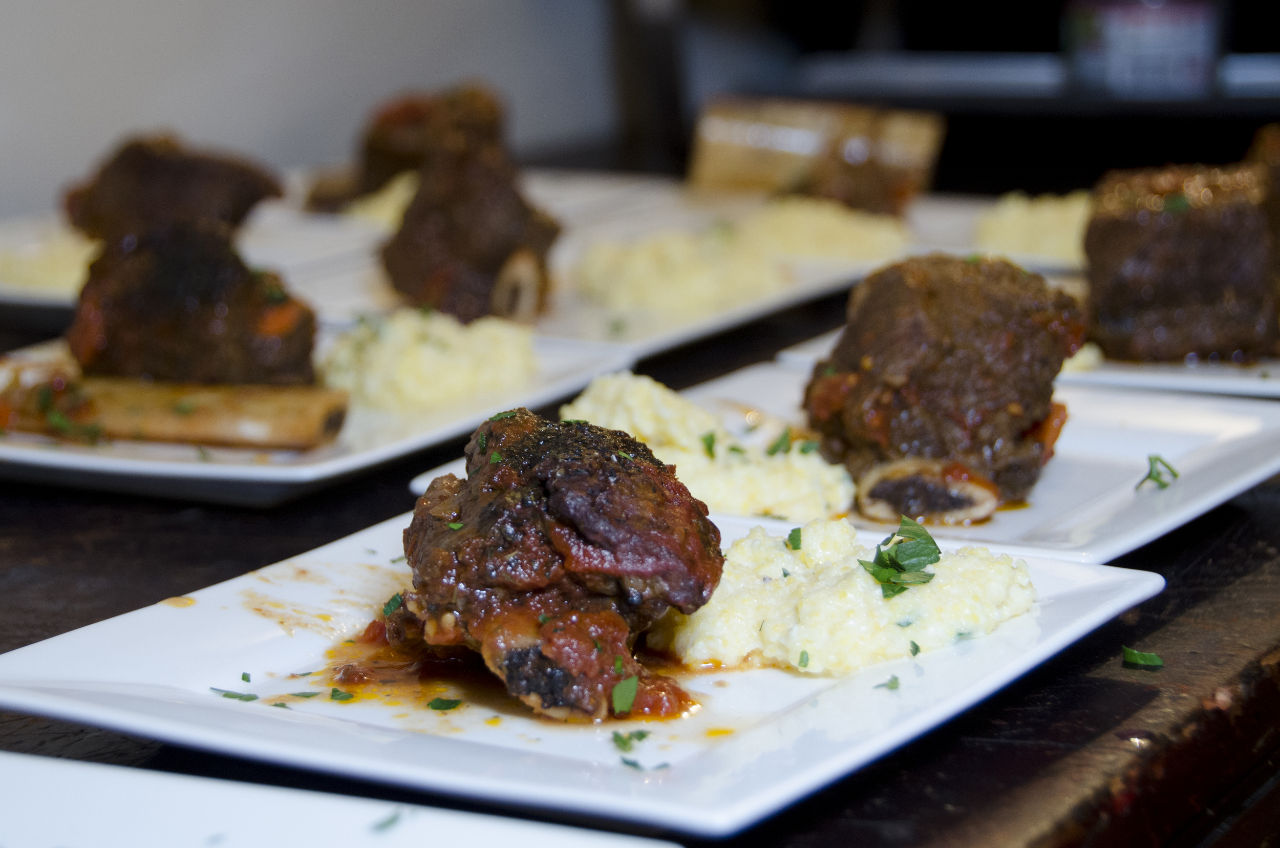  Grass fed beef short ribs slow cooked in Mt. Vesuvius tomatoes with organic polenta 
