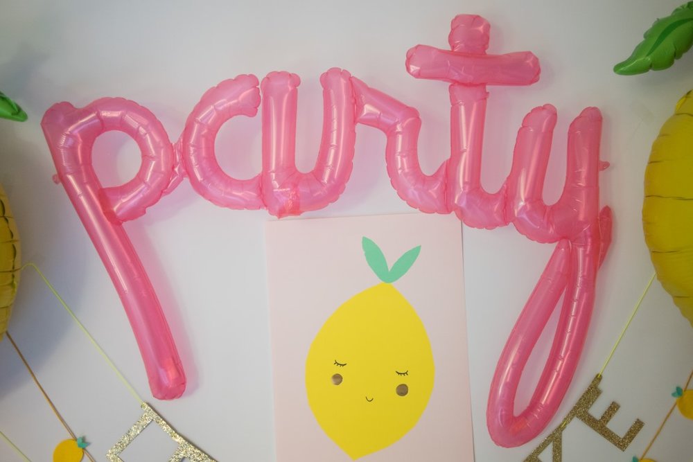 Script Balloon Spells "Party" in Clear Pink