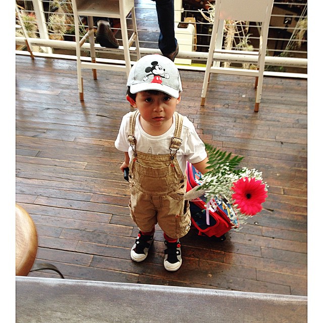 Special delivery. 💐 This little guy came by to give his mom, our manager, a flower for Mother's Day. So cute! ☺️ Happy Mother's Day to all the moms! #mothersday #mom #mother #cutie #cute #momandson #son #delivery #flowers #love #family #happy #packi