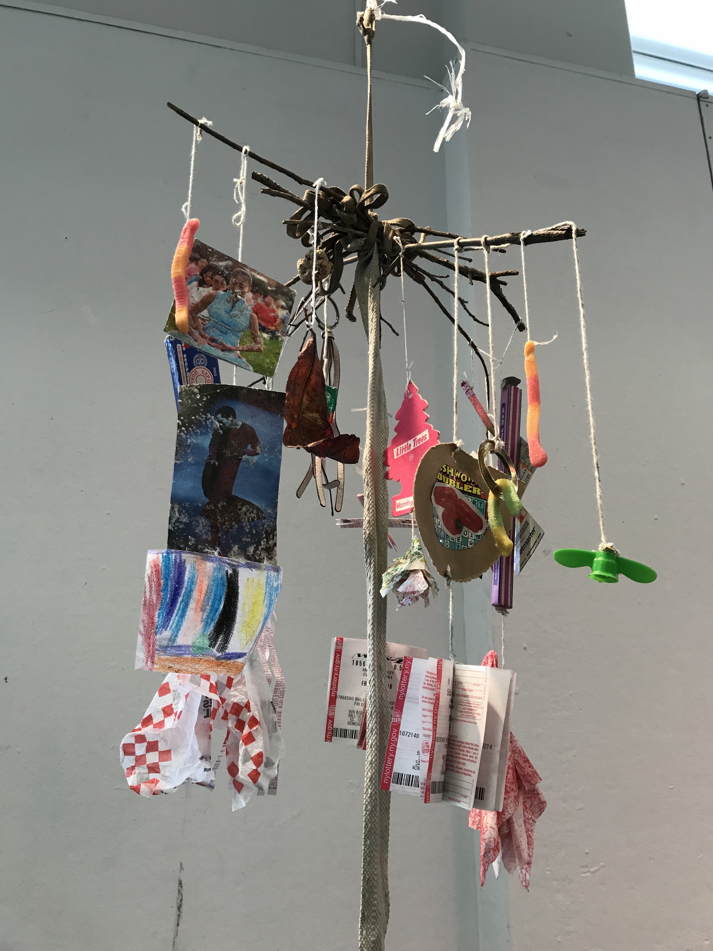 A mobile made entirely from objects found on the street