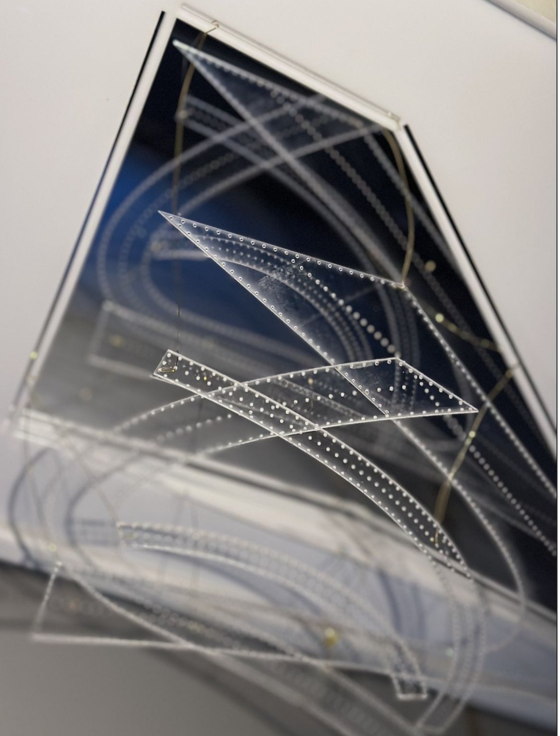  Model of a structure made entirely of ramps, envisioning how accessible architecture can be designed on a large scale. Made using clear acrylic, mirrors, and jewelry wire. 