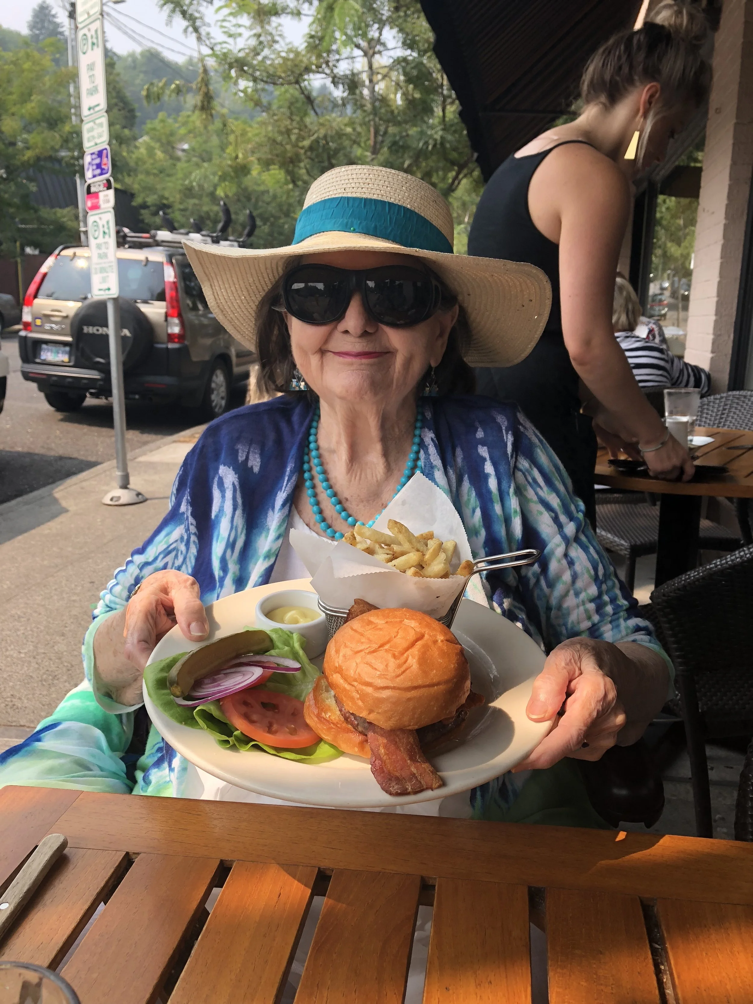 My 90-year-old friend Dolly, eating a burger that is not a Burger Week Burger. 