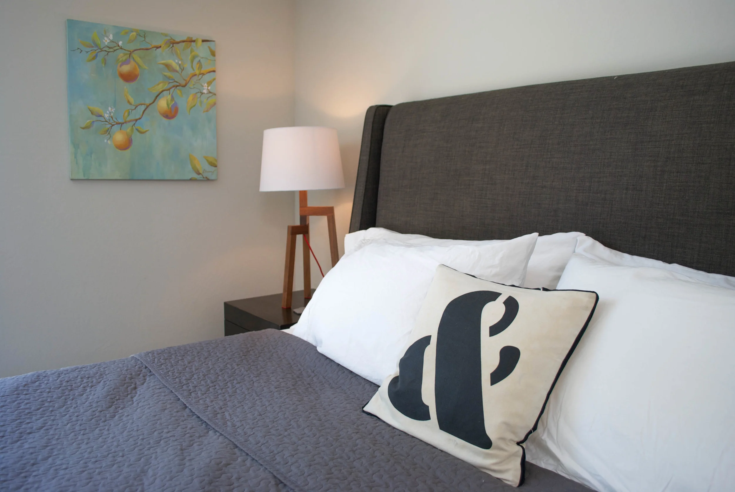 One of Laura's paintings adds a splash of colour to the neautral palette.