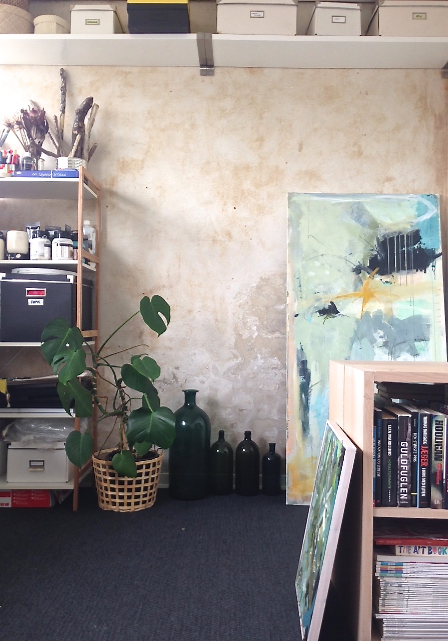 A peak inside her studio space. Lot's of room for storage and books.