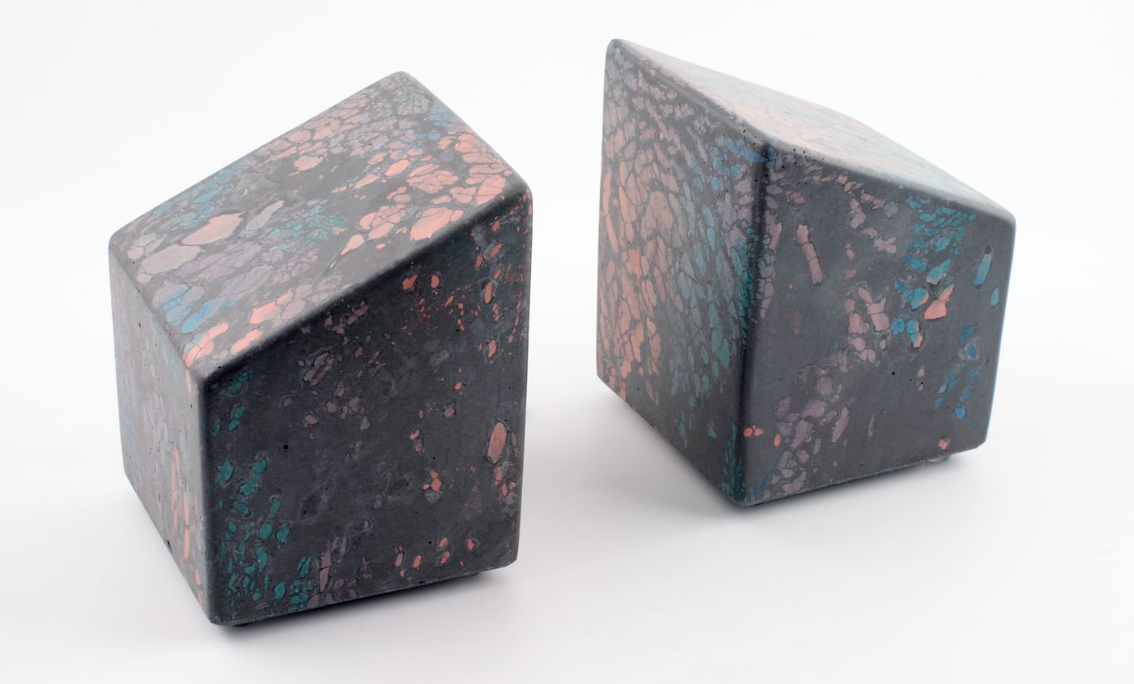Atlas Bookends would be a unique addition to your library or bookshelf. They also carry some lovely vases that would look amazing as sculptures even without flowers in them.