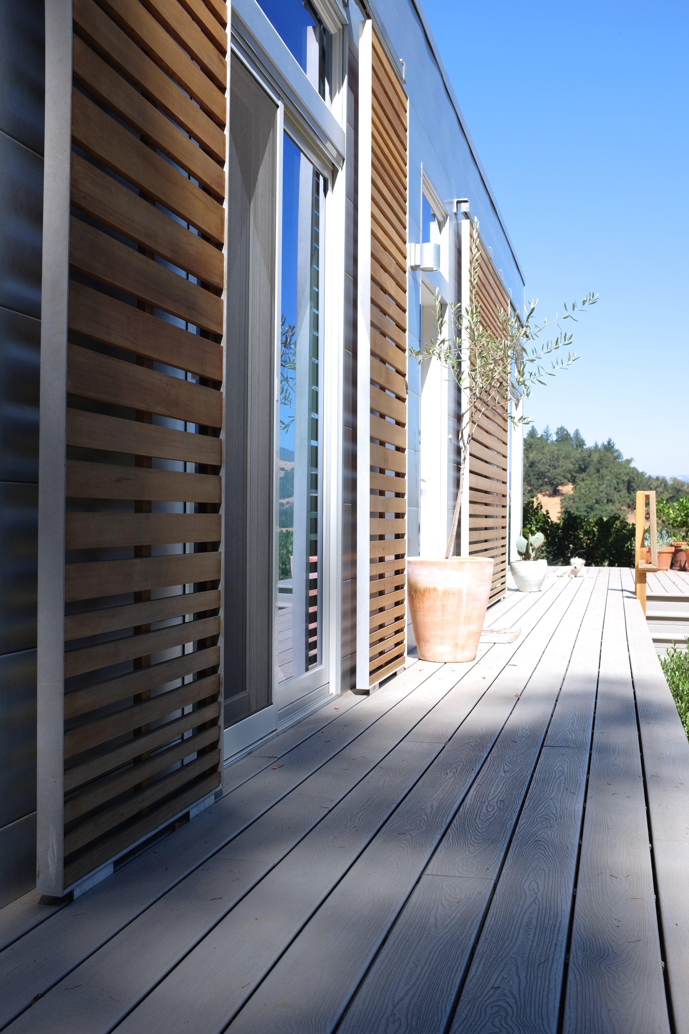 One of Kim's favourite things about her home are the sliding doors that are all along one side of the house. They open it up and enjoy a fresh breeze and amazing view.