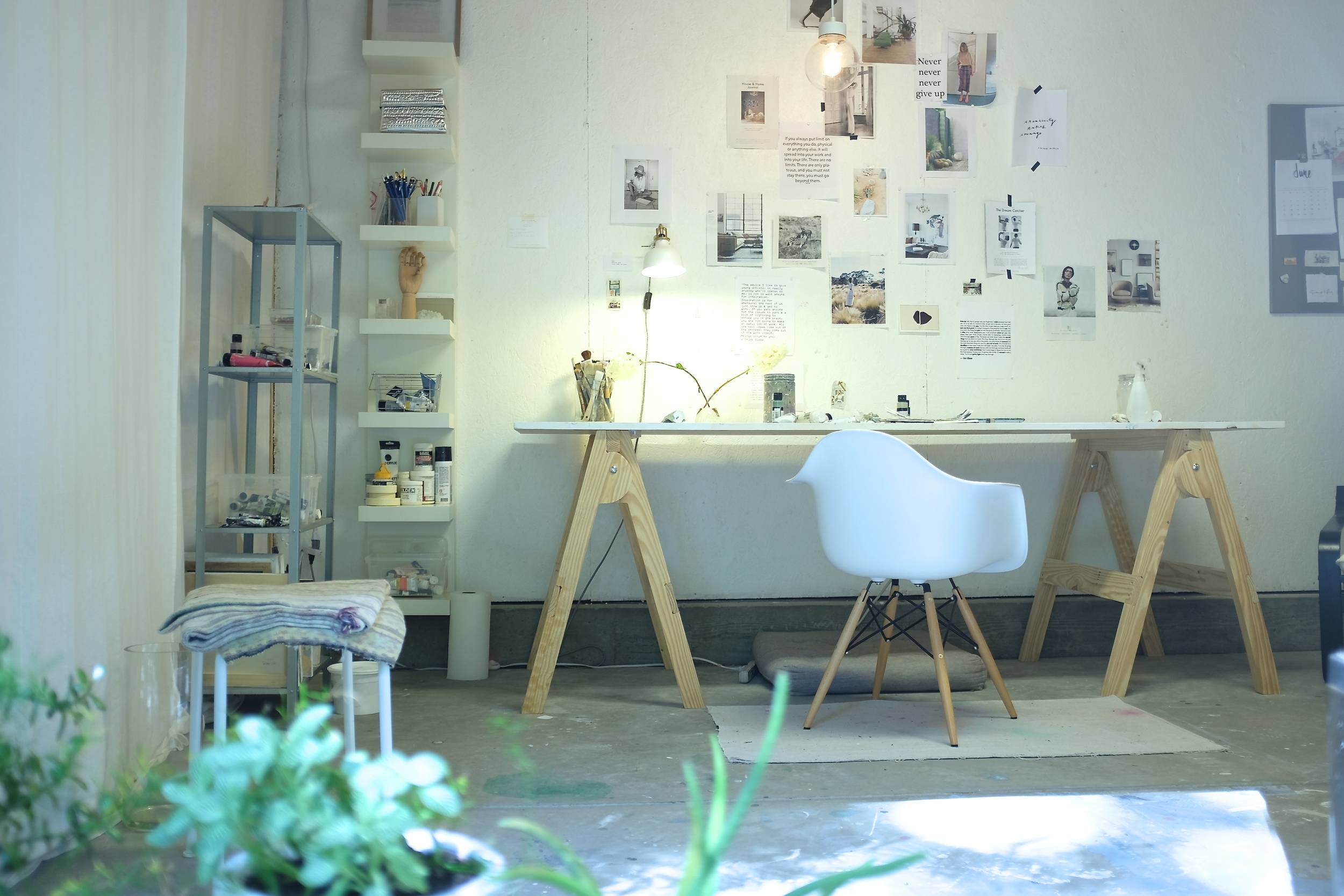 A peak into Kim's private work studio. Her inspiration wall is filled with inspirational photos and quotes.